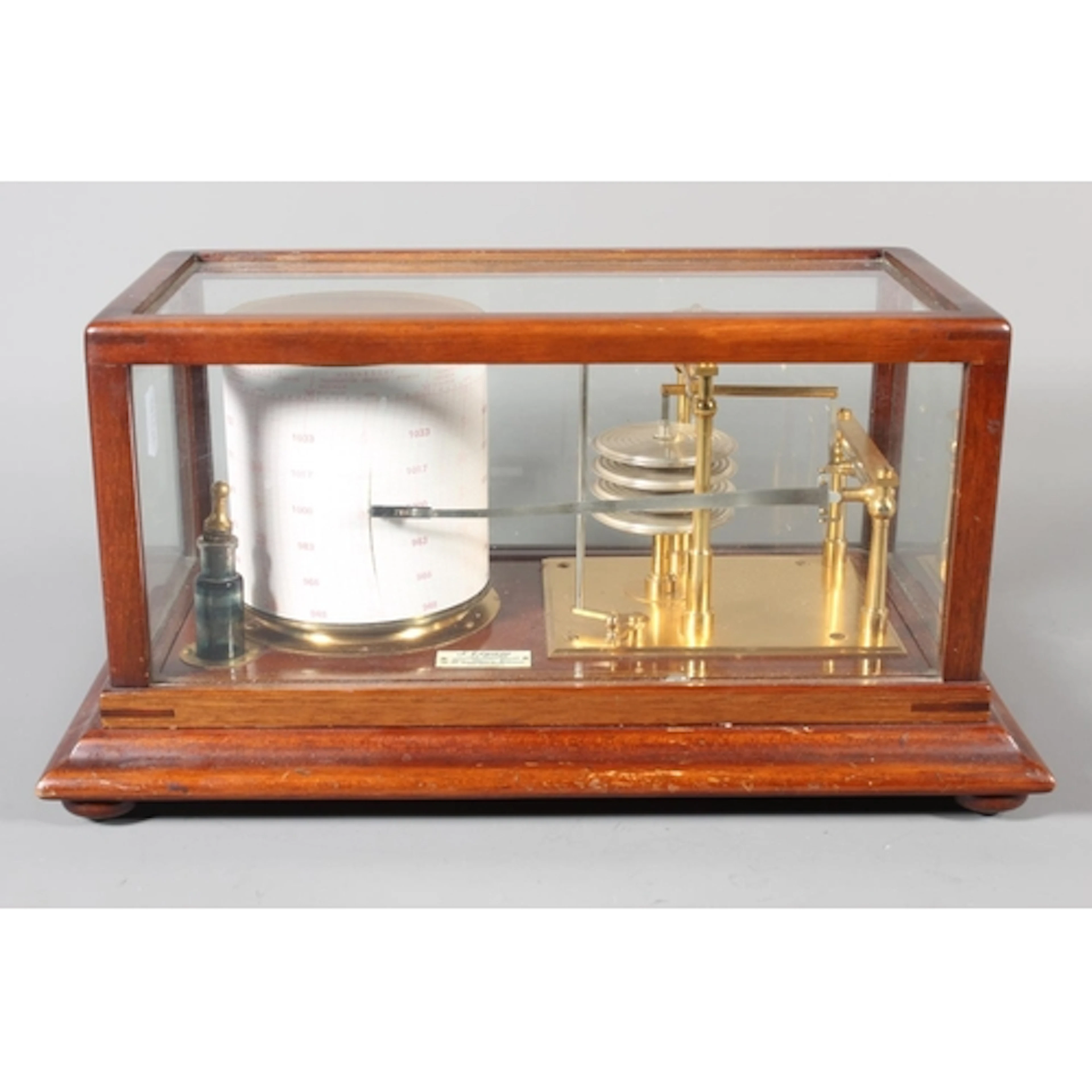 Antique mahogany cased four glass barograph raised on bun su...