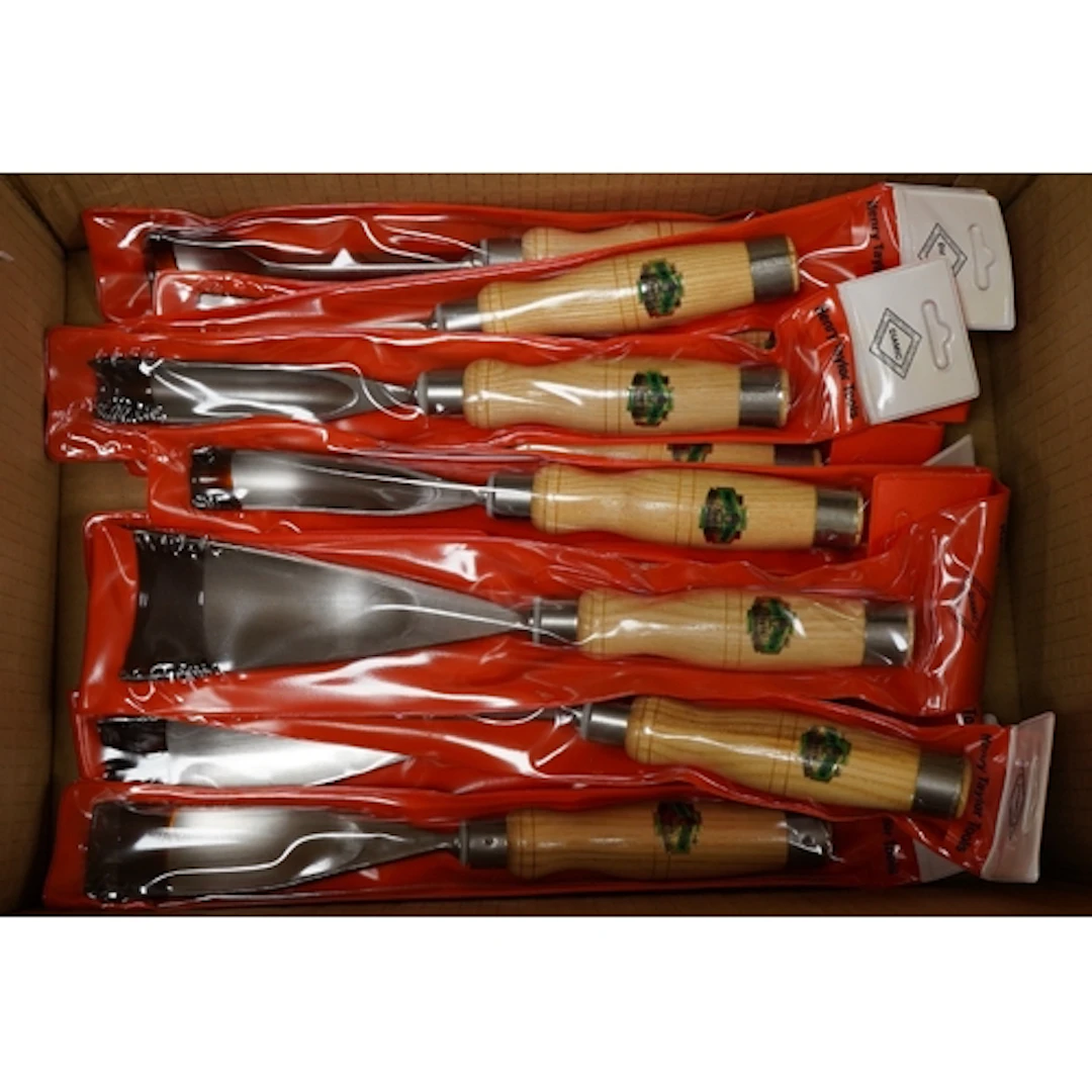 A set of eleven individually packeted Henry Taylor Tools lar...