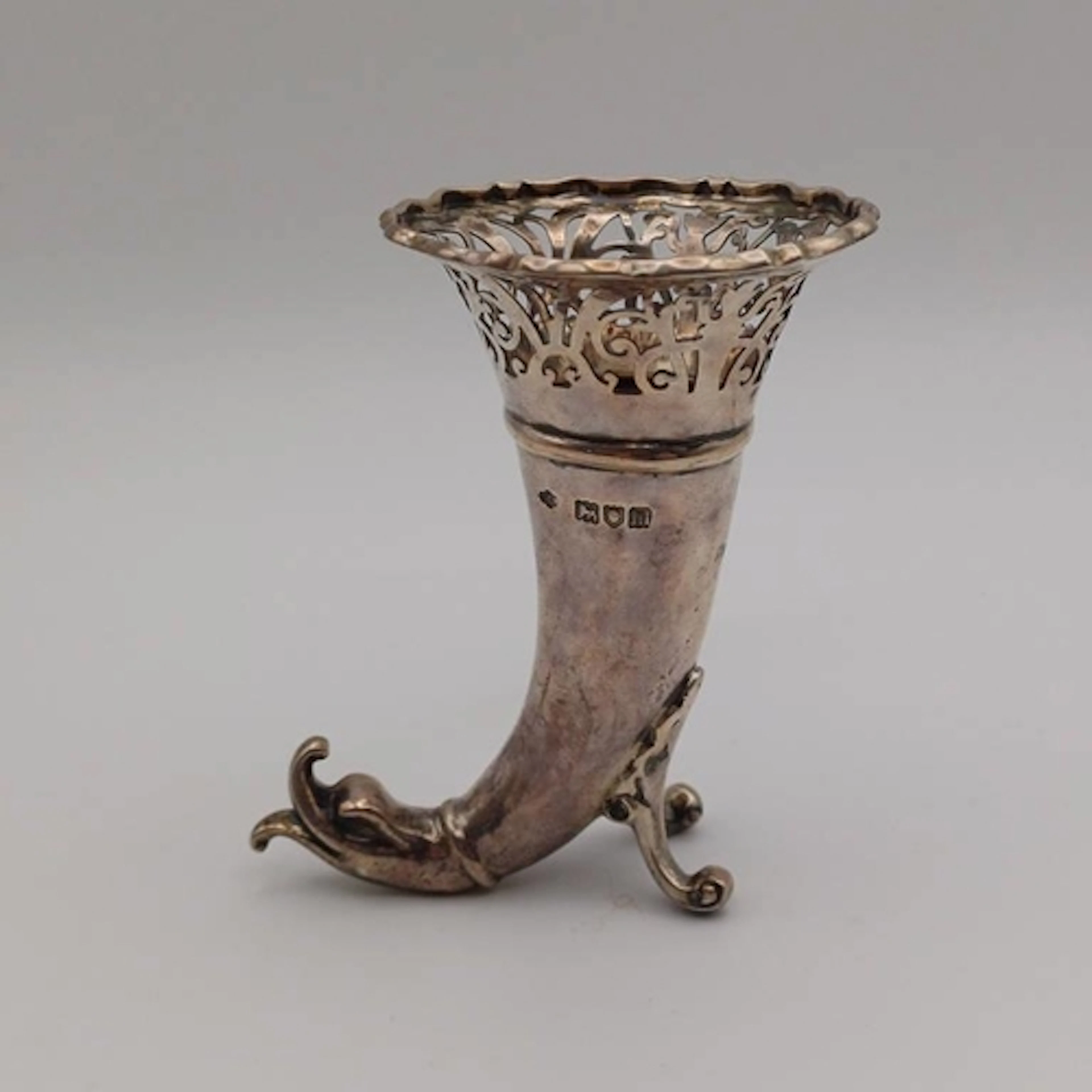 A SMALL SILVER CORNUCOPIA VASE WITH FLARED & PIERCED RIM ON ...