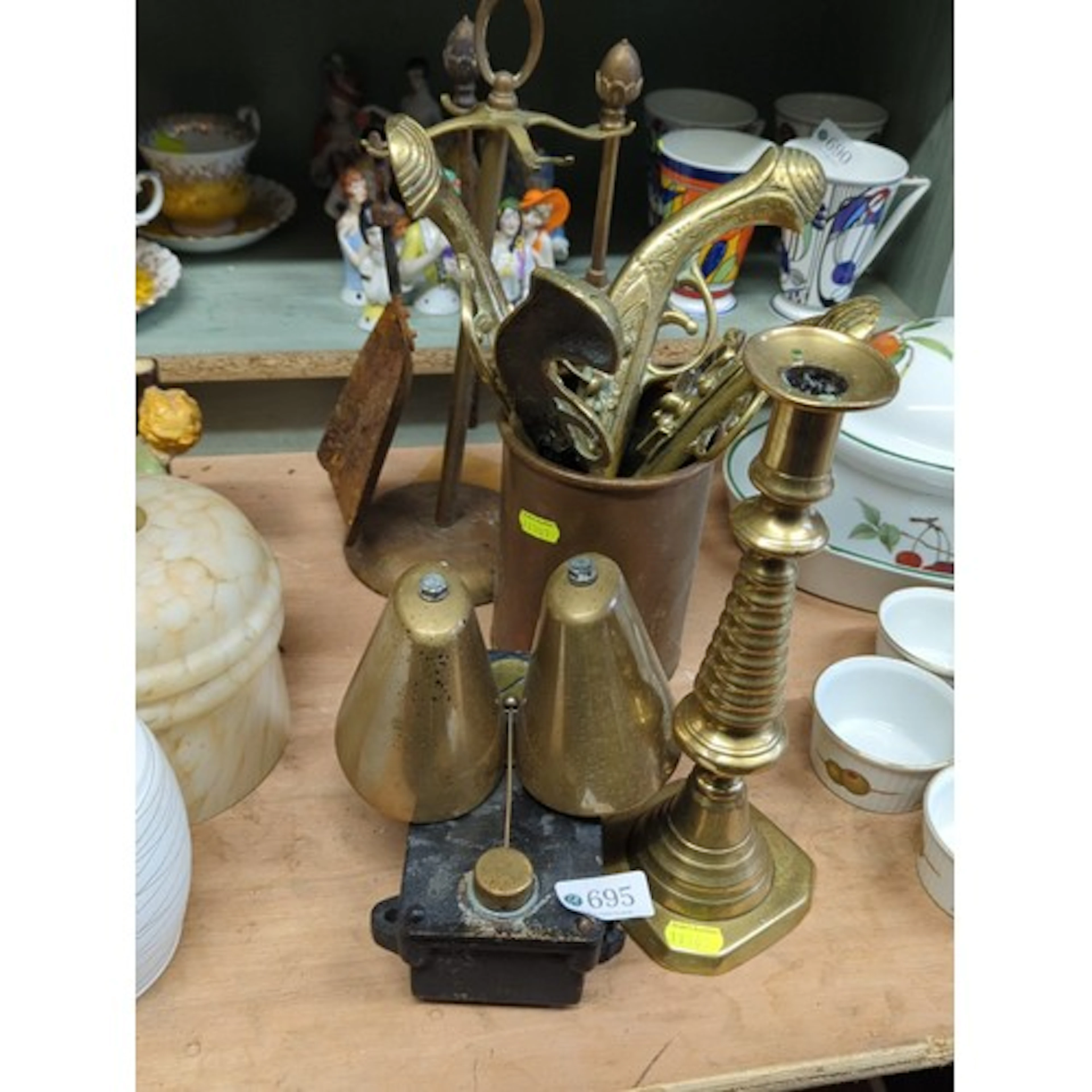A group of brass and copper domestic wares, including a pair...