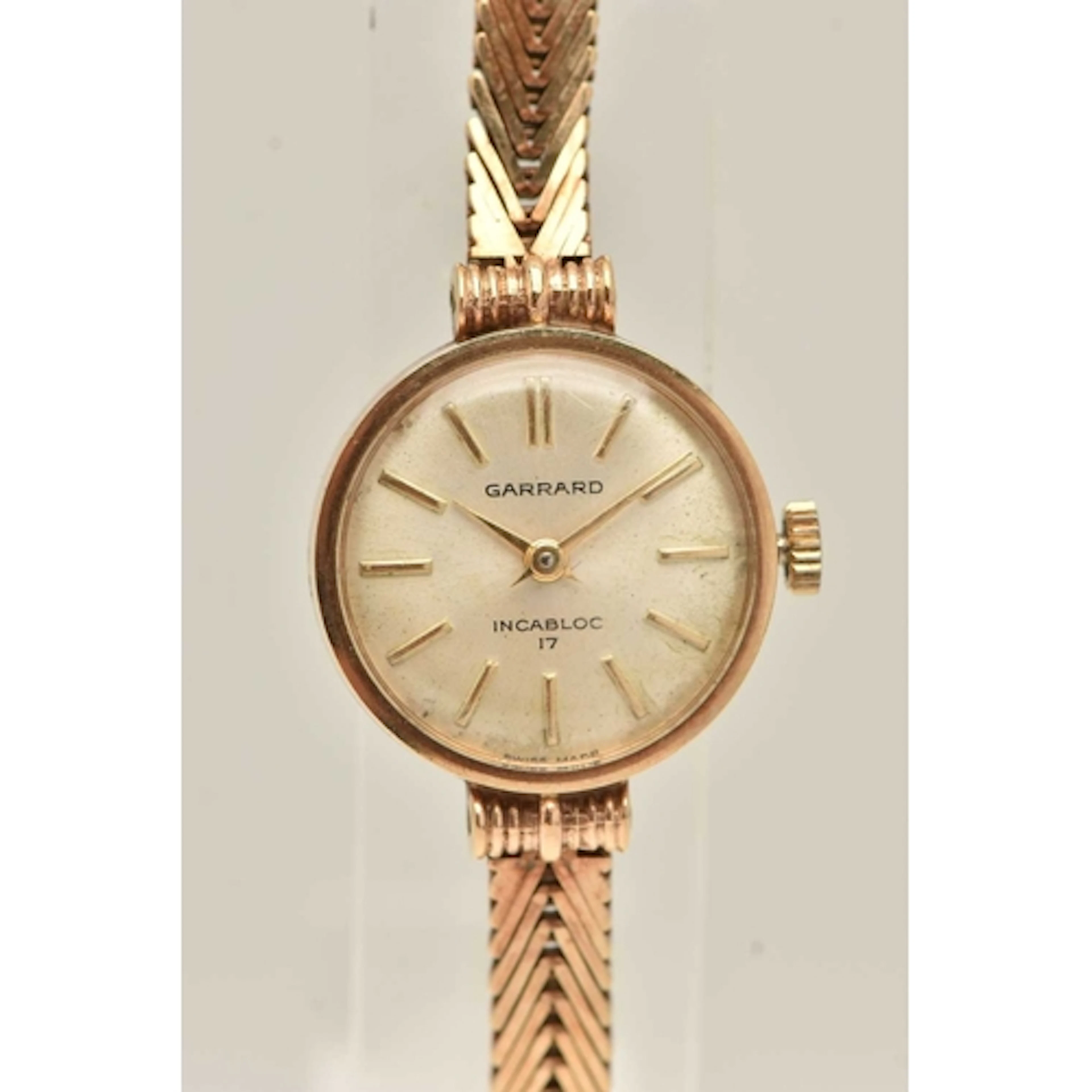 A LADIES BOXED 9CT GOLD 'GARRARD' WRISTWATCH, manual wind, r...