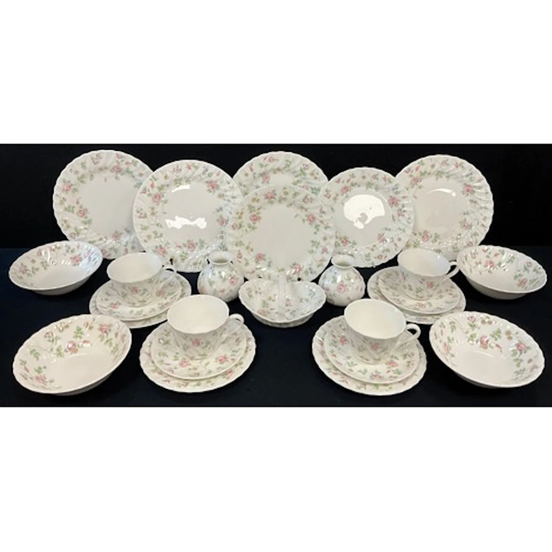 A Wedgwood Rosehip pattern tea set, for four, with pair of g...