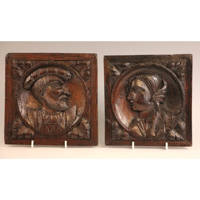 A pair of 16th century style carved oak bas-relief Romayne-t...
