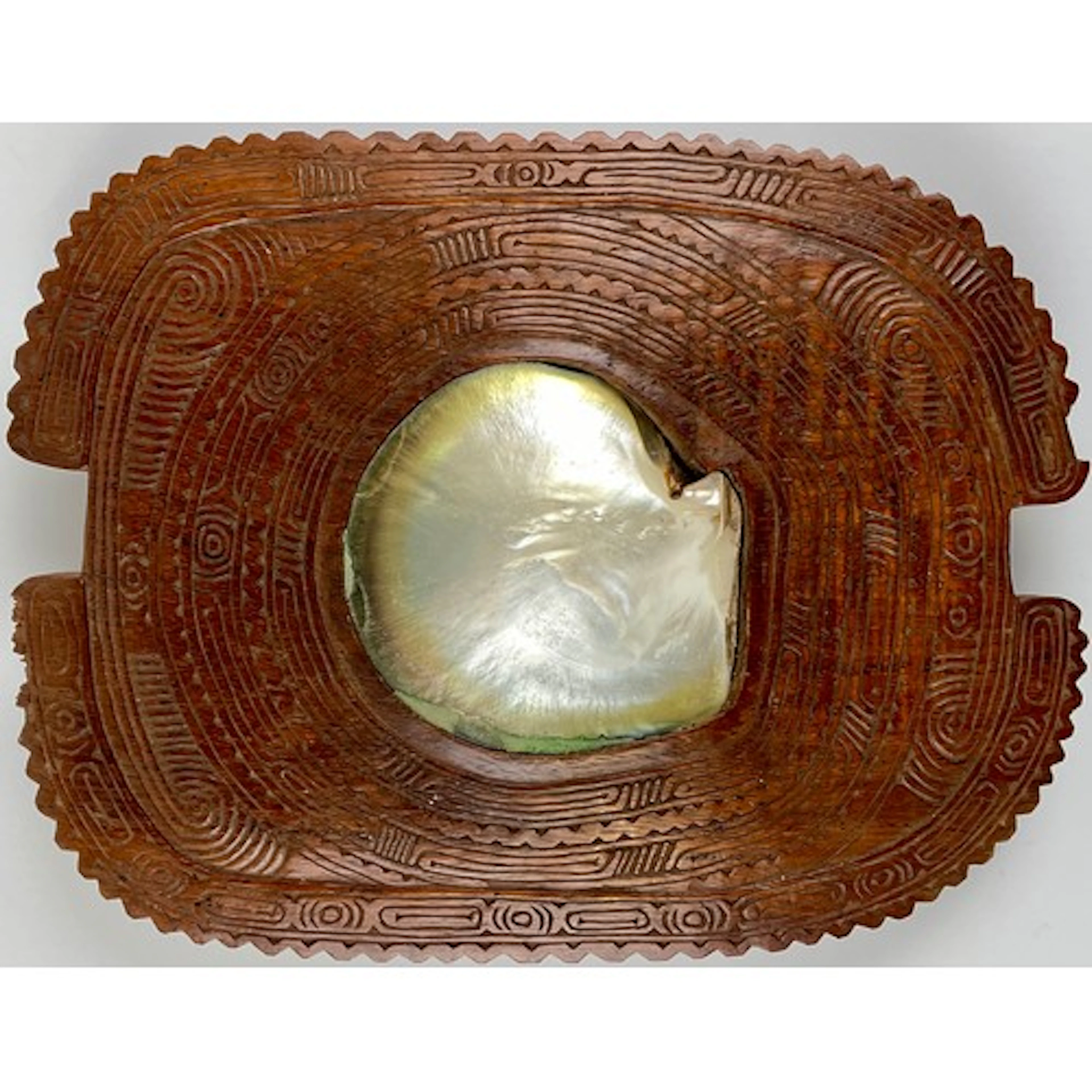 A Polynesian hardwood kava bowl, carved with a border of geo...