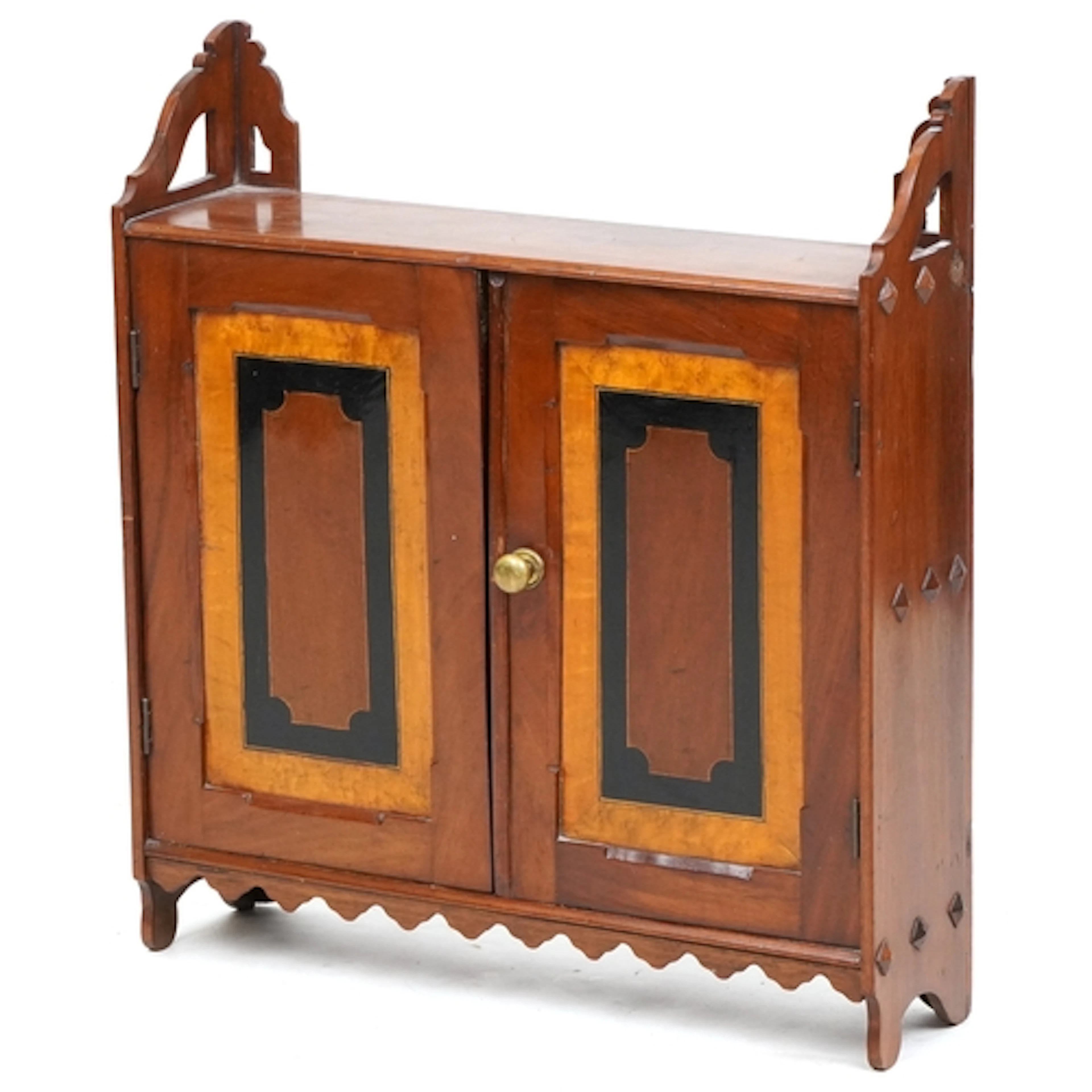A late Victorian Aesthetic movement mahogany hanging wall ca...