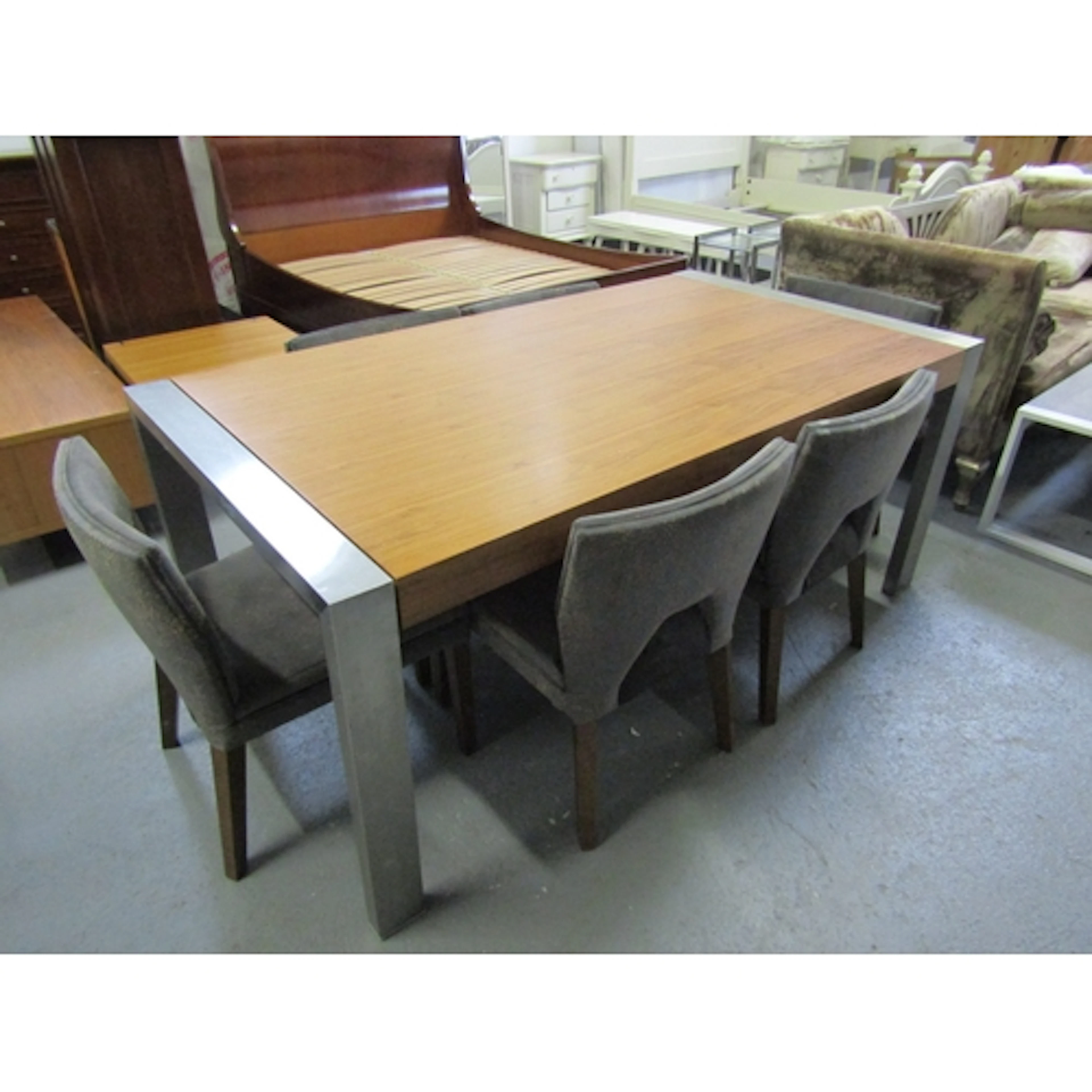 Designer Rectangular Form Dinning Table with Metal Ends Soun...