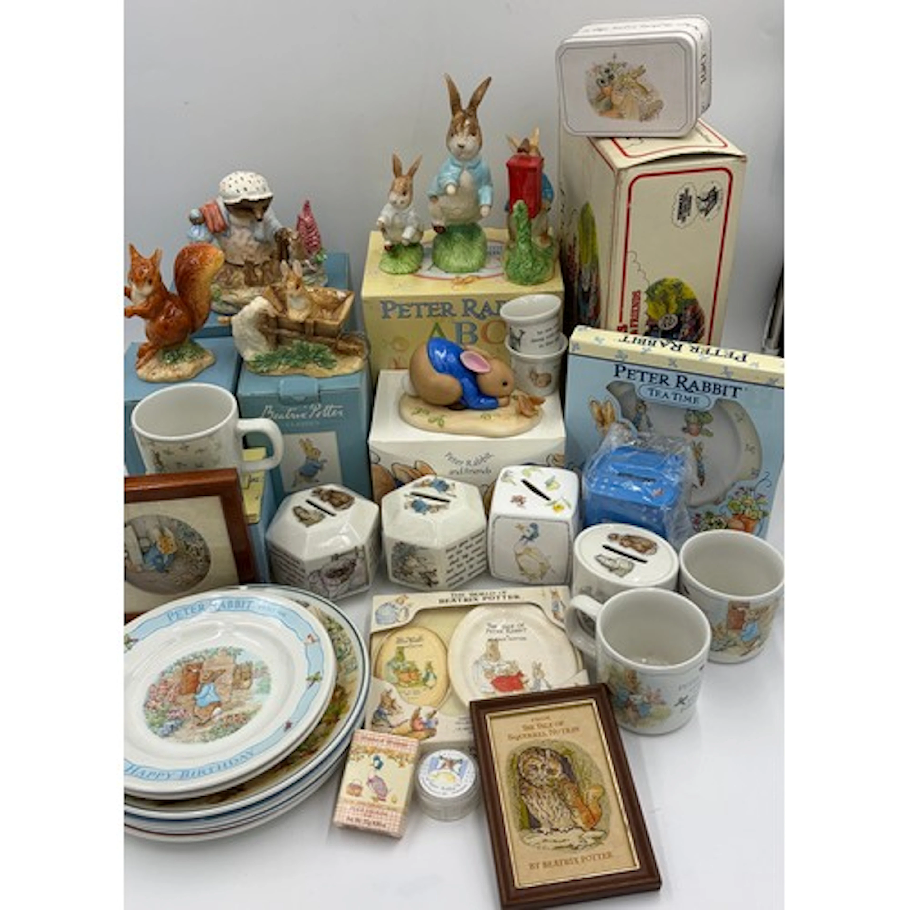 A collection of Beatrix Potter ceramics to include Wedgwood,...