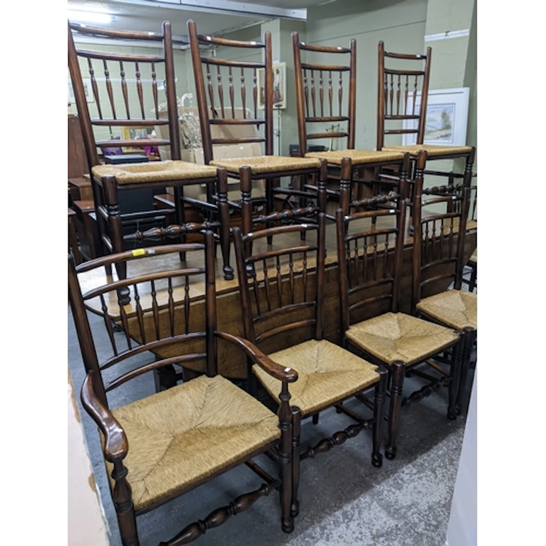 A set of ten Lancashire style spindle back dining chairs, (t...