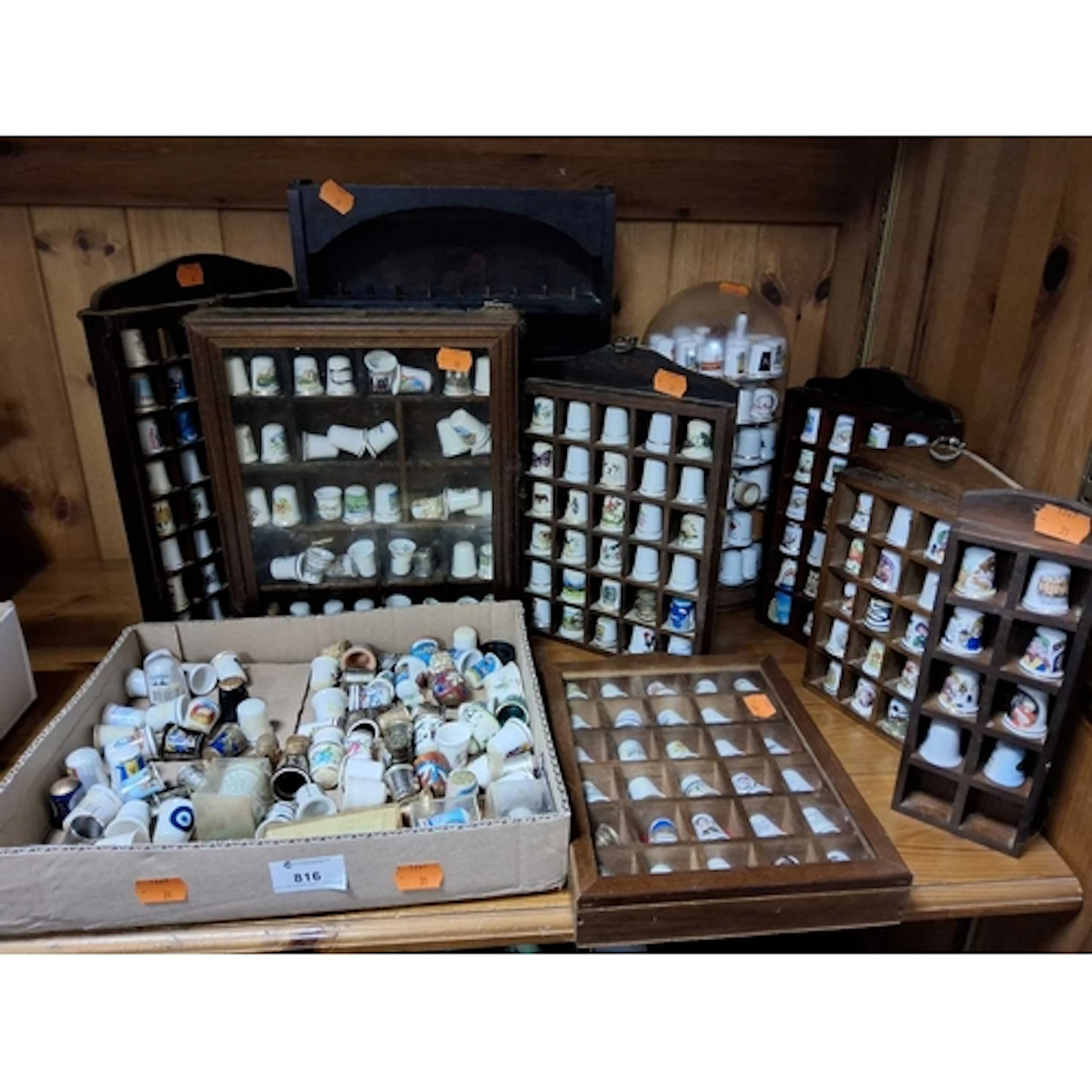 A BOX AND LOOSE THIMBLES, a quantity of mainly porcelain/bon...