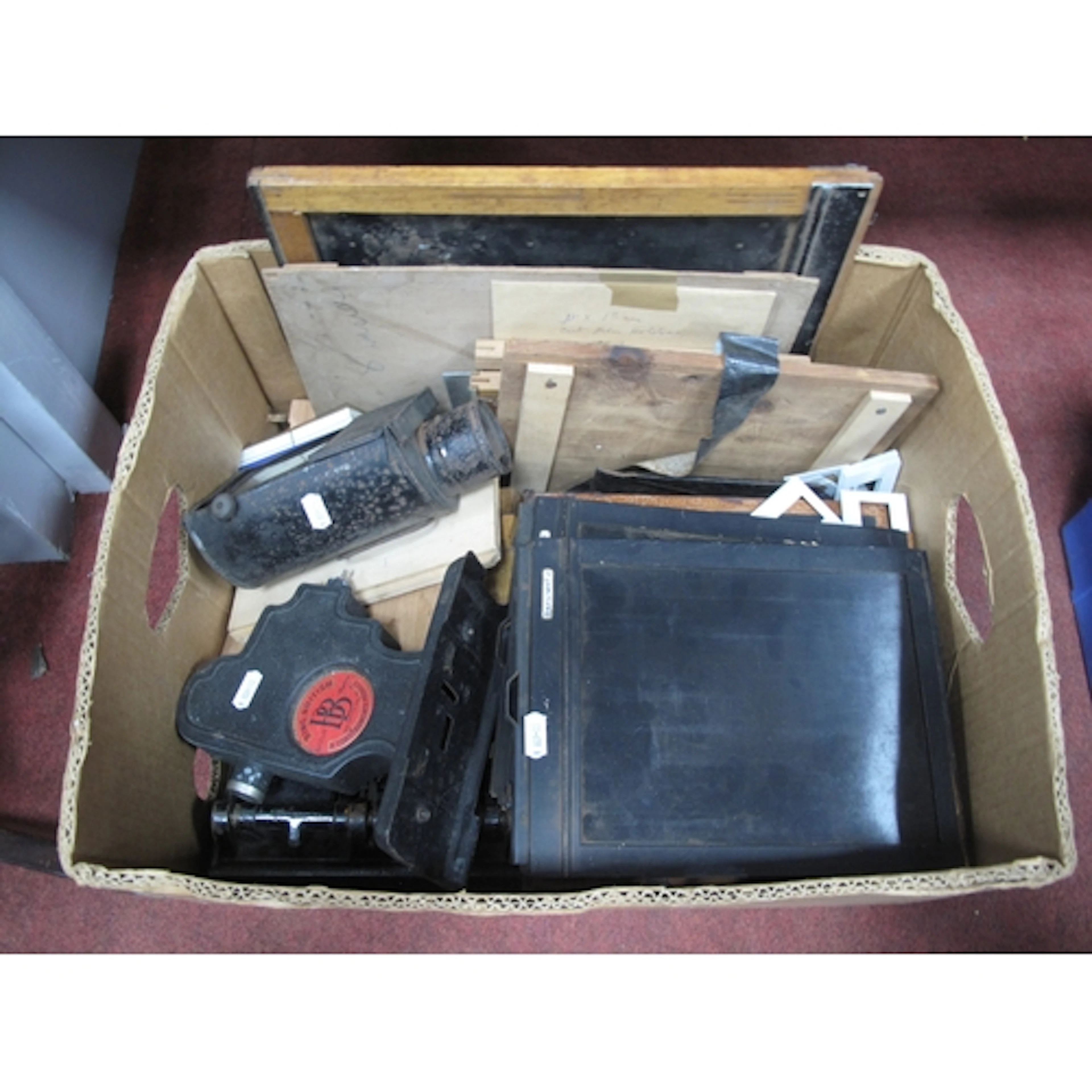 Vintage photographic equipment, including heavy-duty cast-me...