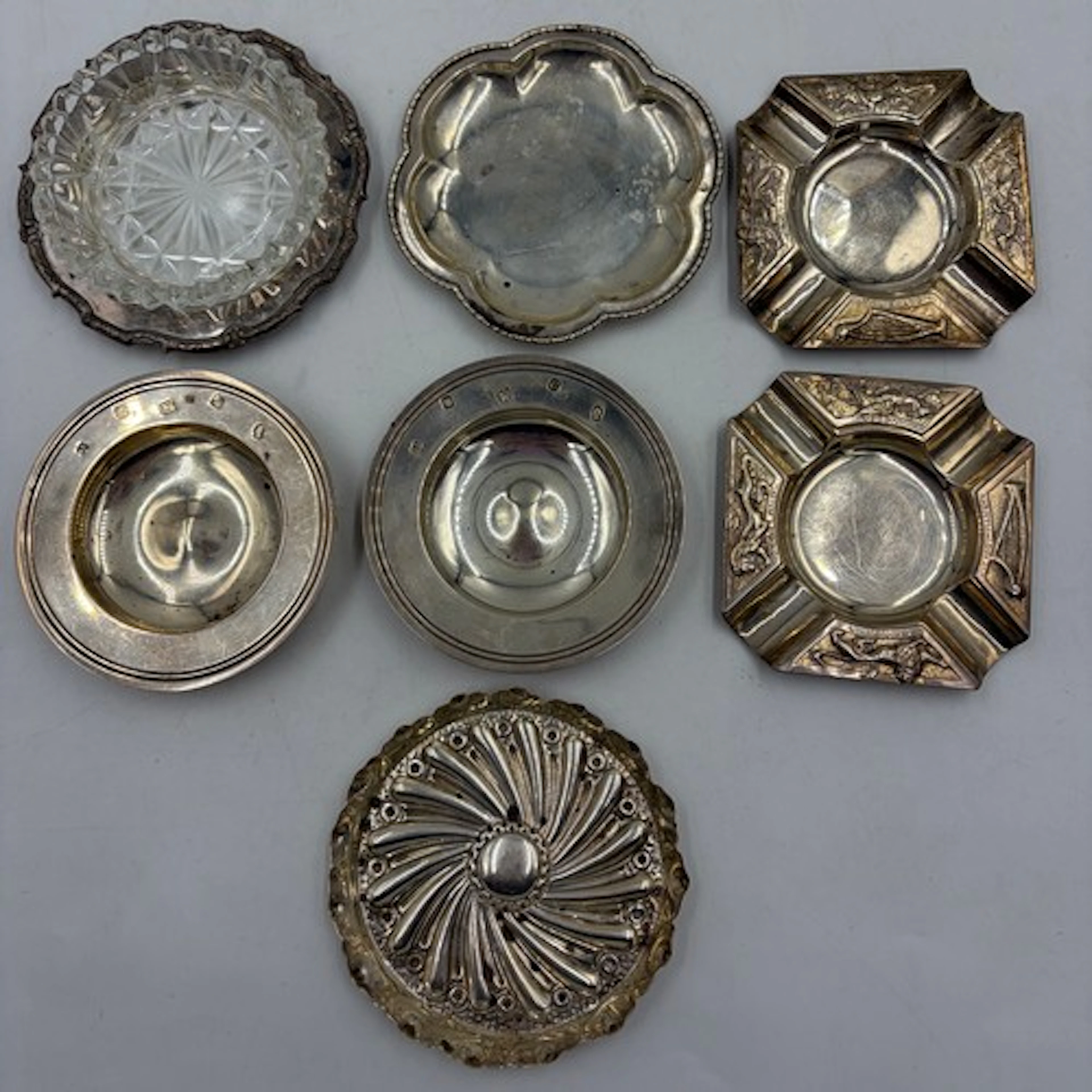 A pair of silver Armada dishes marked William Comyns & Sons ...