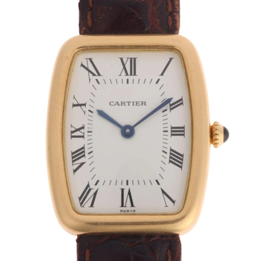 CARTIER - an 18ct gold Incurvee "Faberge" mechanical wristwa...