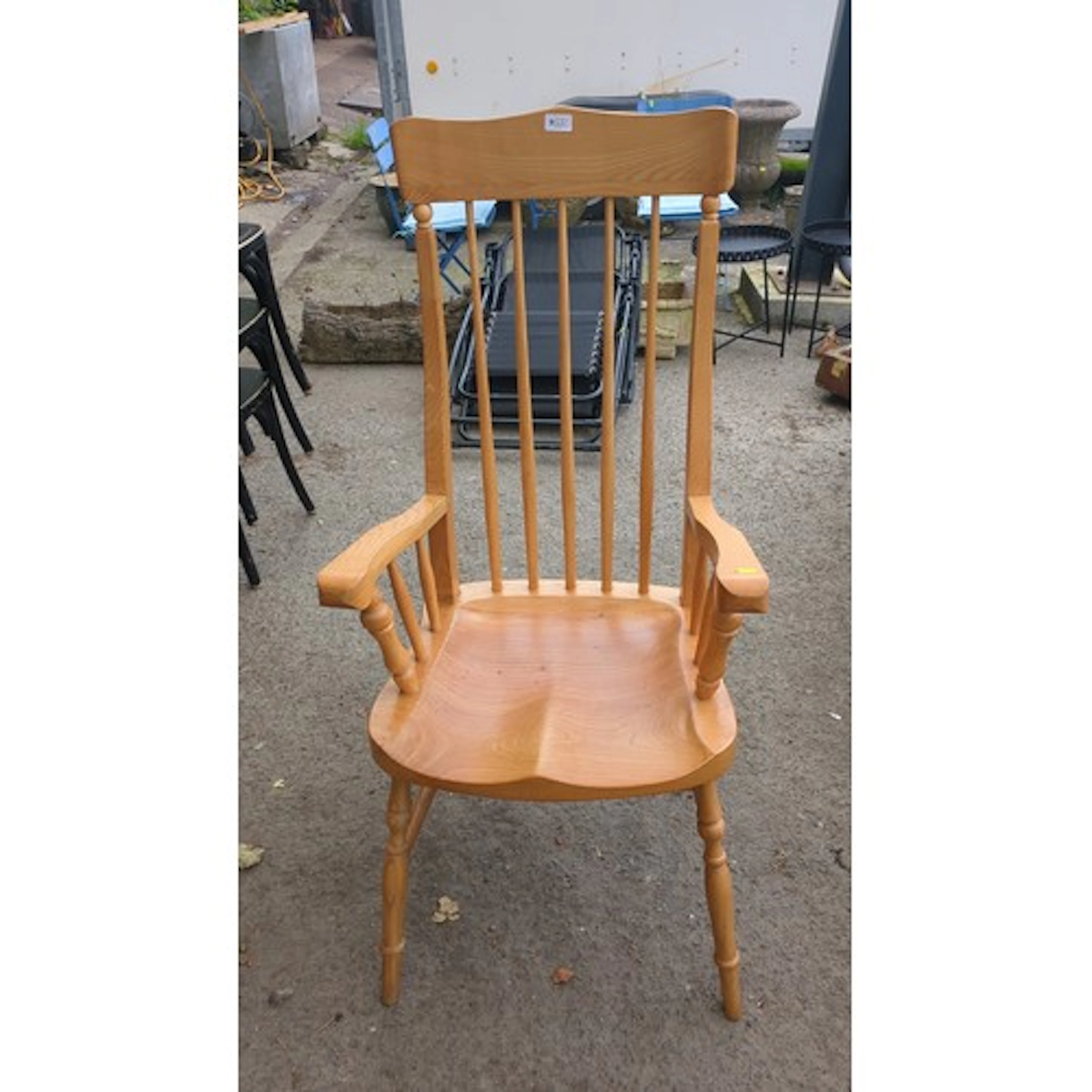 Modern beech and elm Windsor armchair, the shaped crest rail...