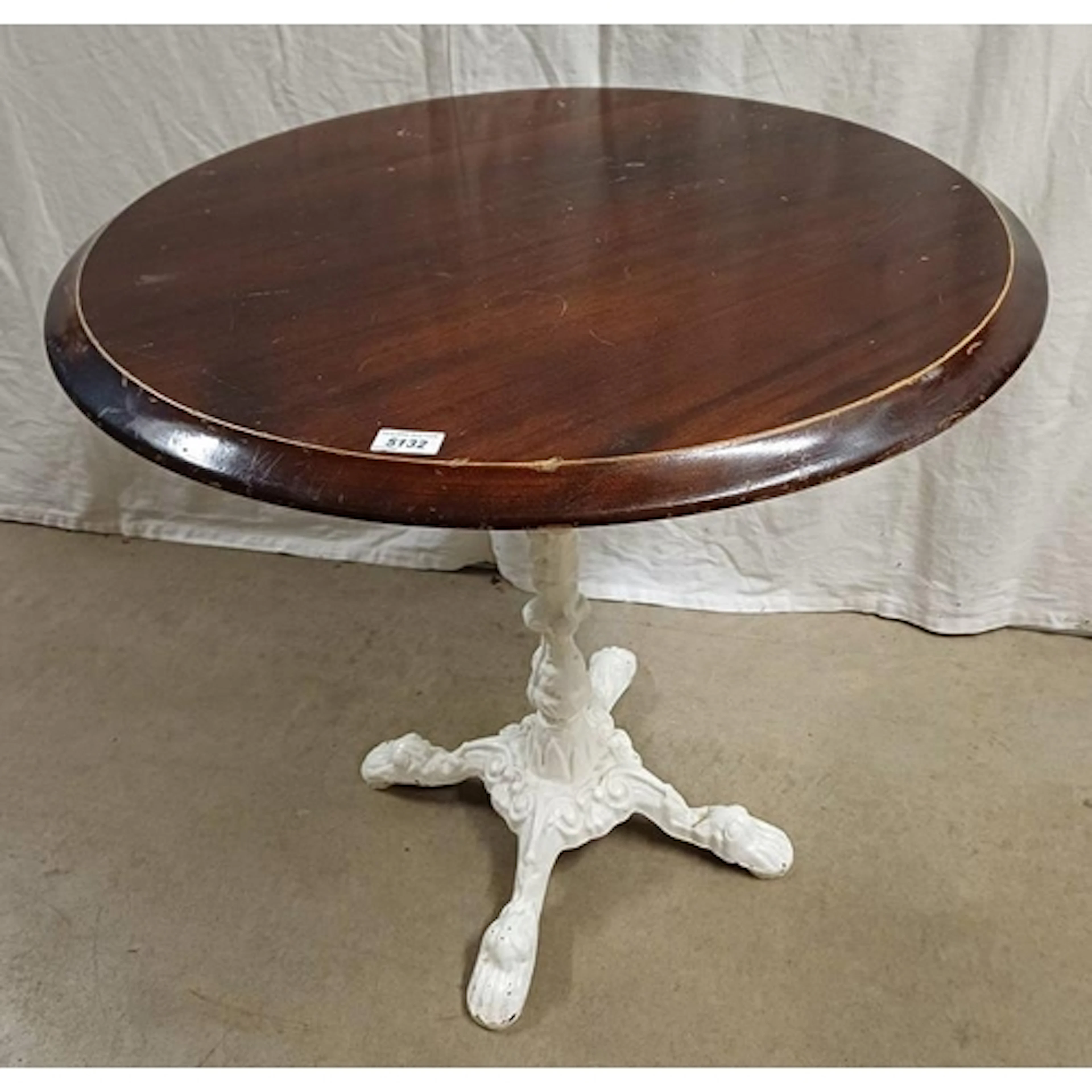 MAHOGANY CIRCULAR PUB TABLE ON PAINTED CAST IRON PEDESTAL WI...