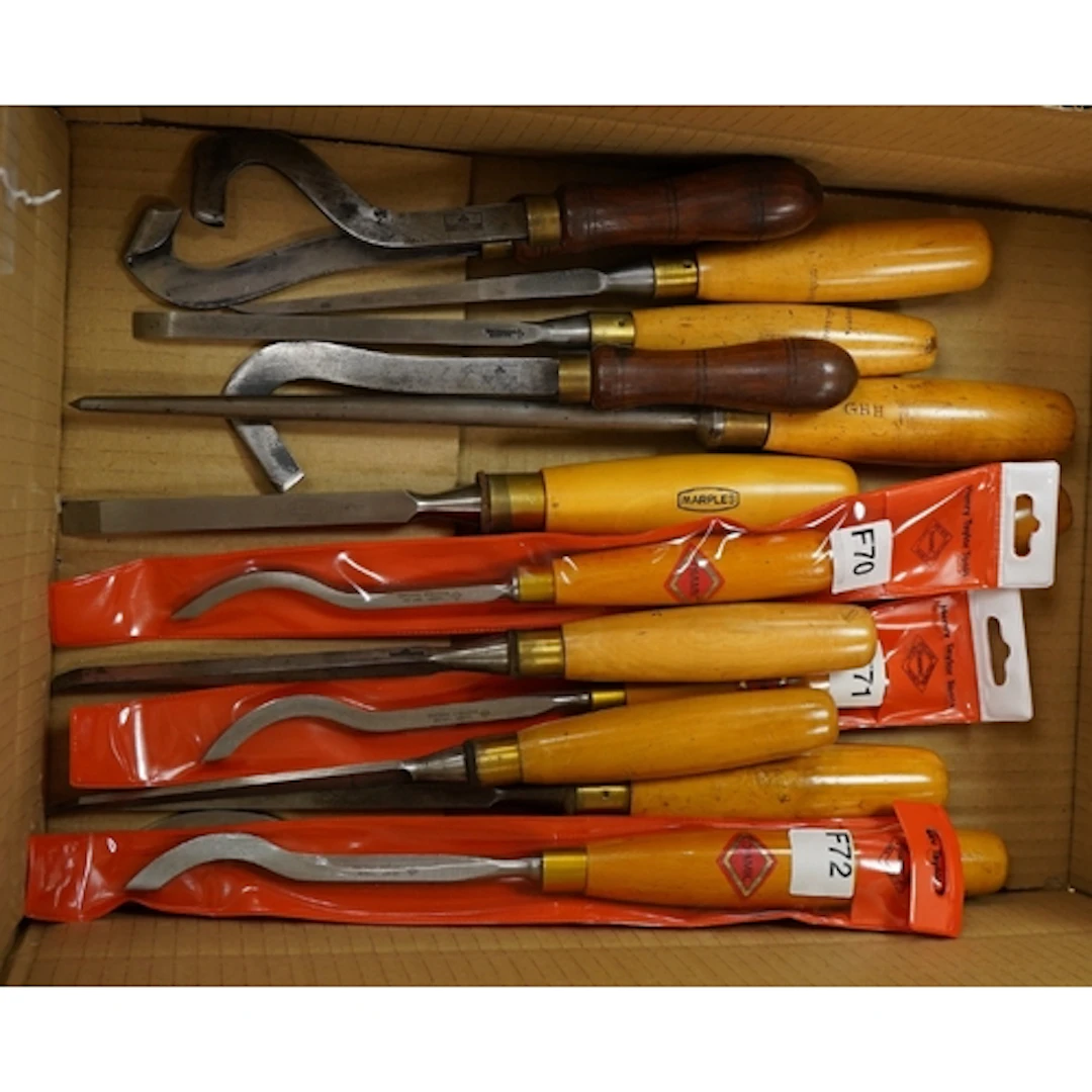 A selection of woodworking tools, including a graduated set ...