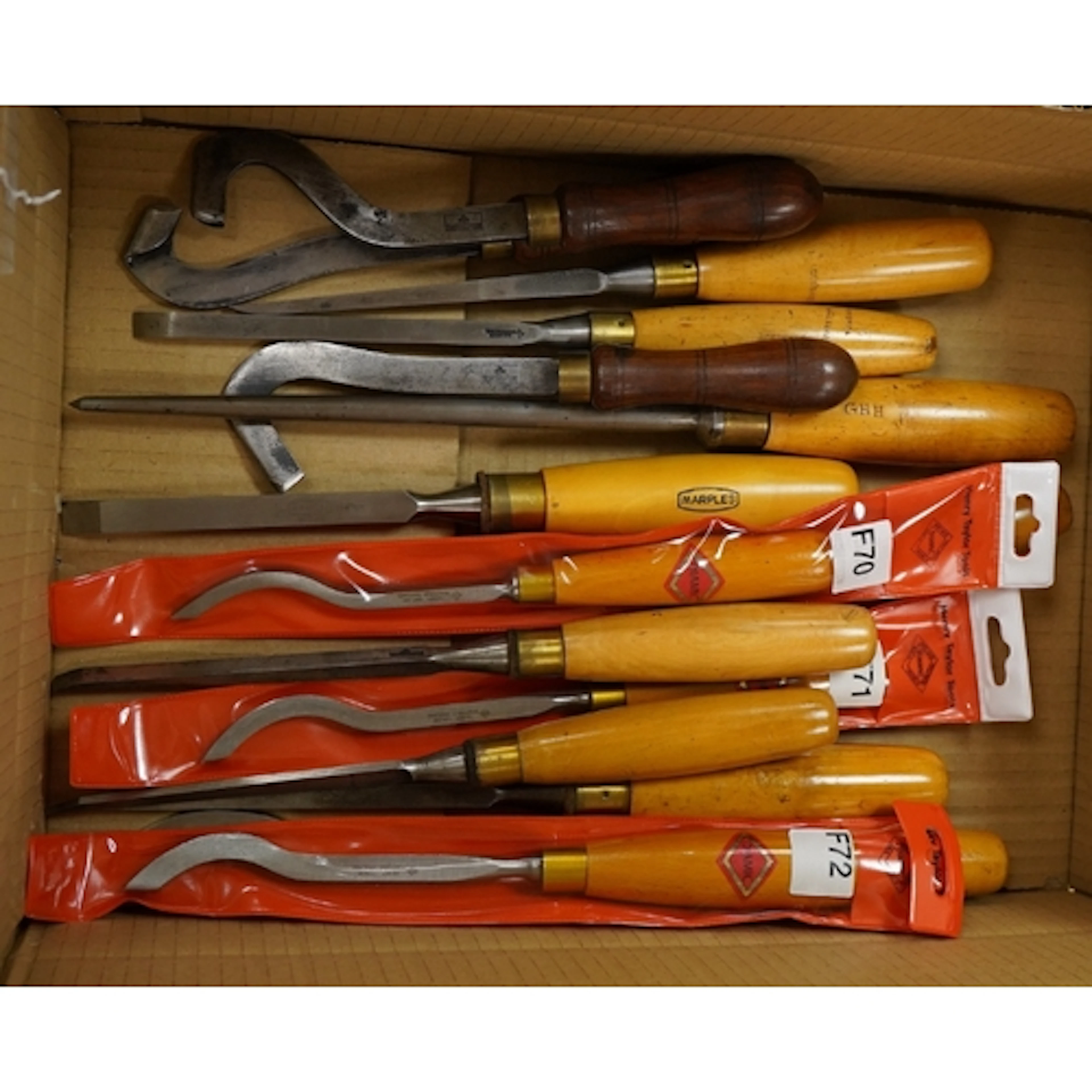 A selection of woodworking tools, including a graduated set ...