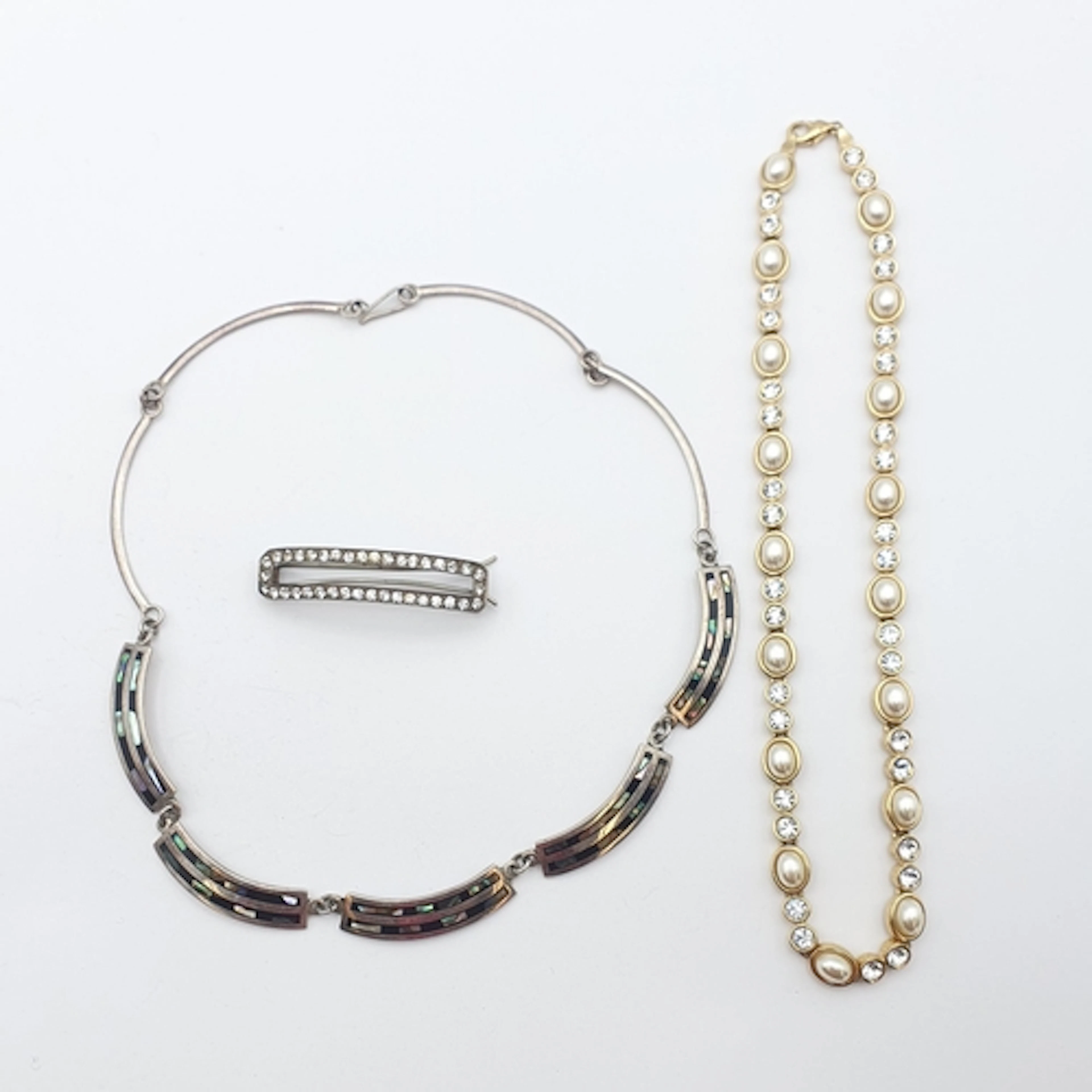 A vintage Paste Hair Slide stamped 'STERLING', a Mexican Sil...
