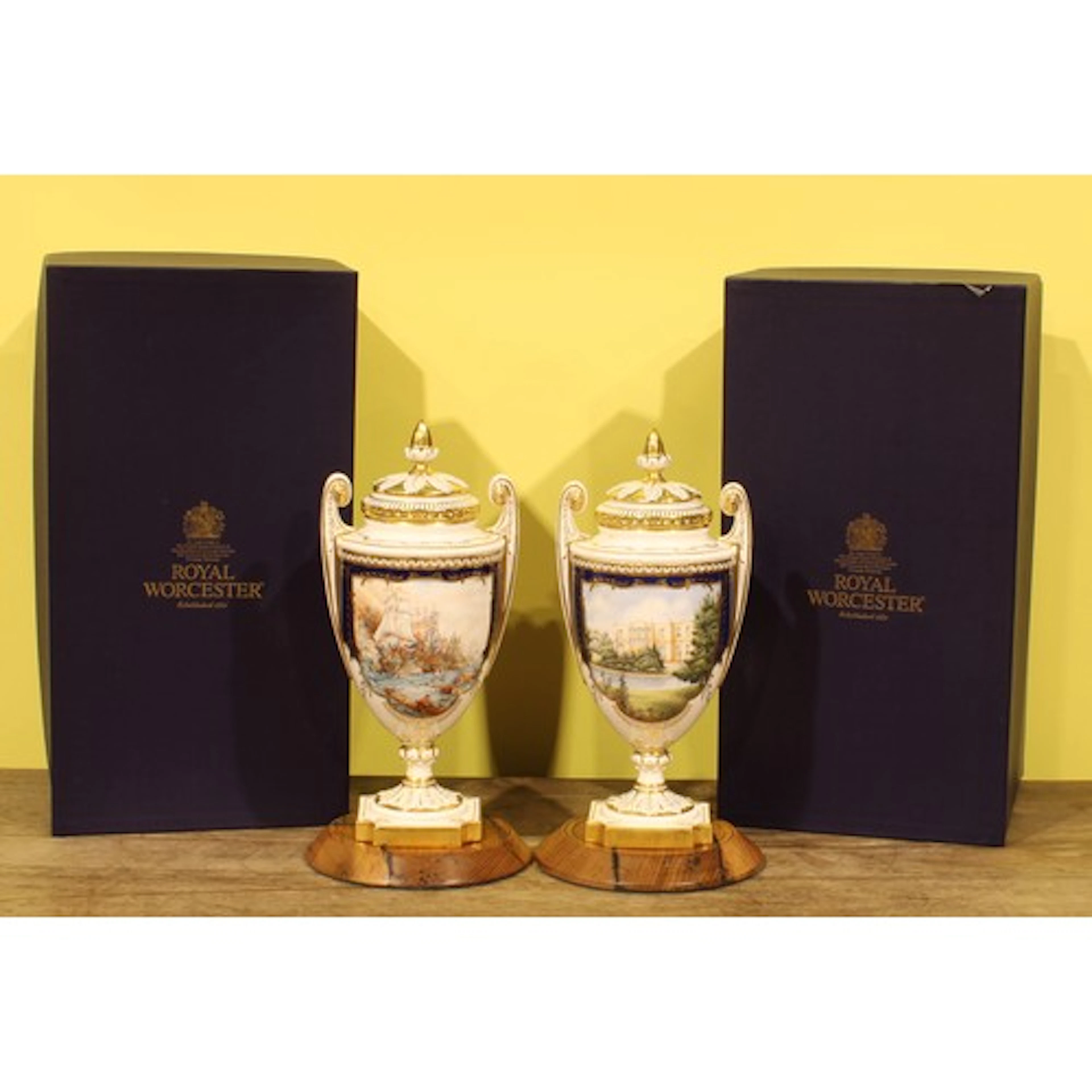 A pair of Royal Worcester bicentenary ceramic urns, from the...