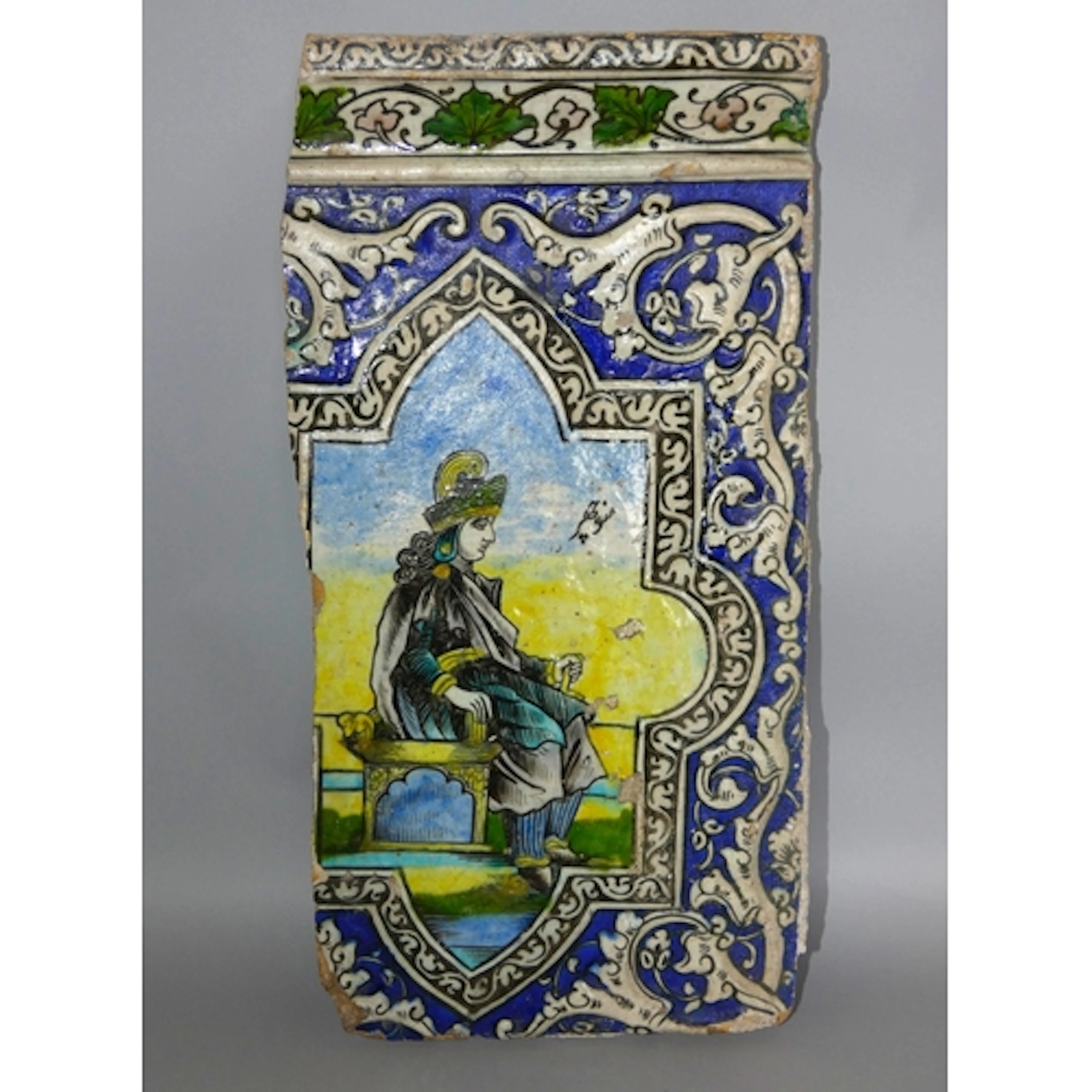 Persian relief moulded polychrome pottery tile, Tehran, c.19...