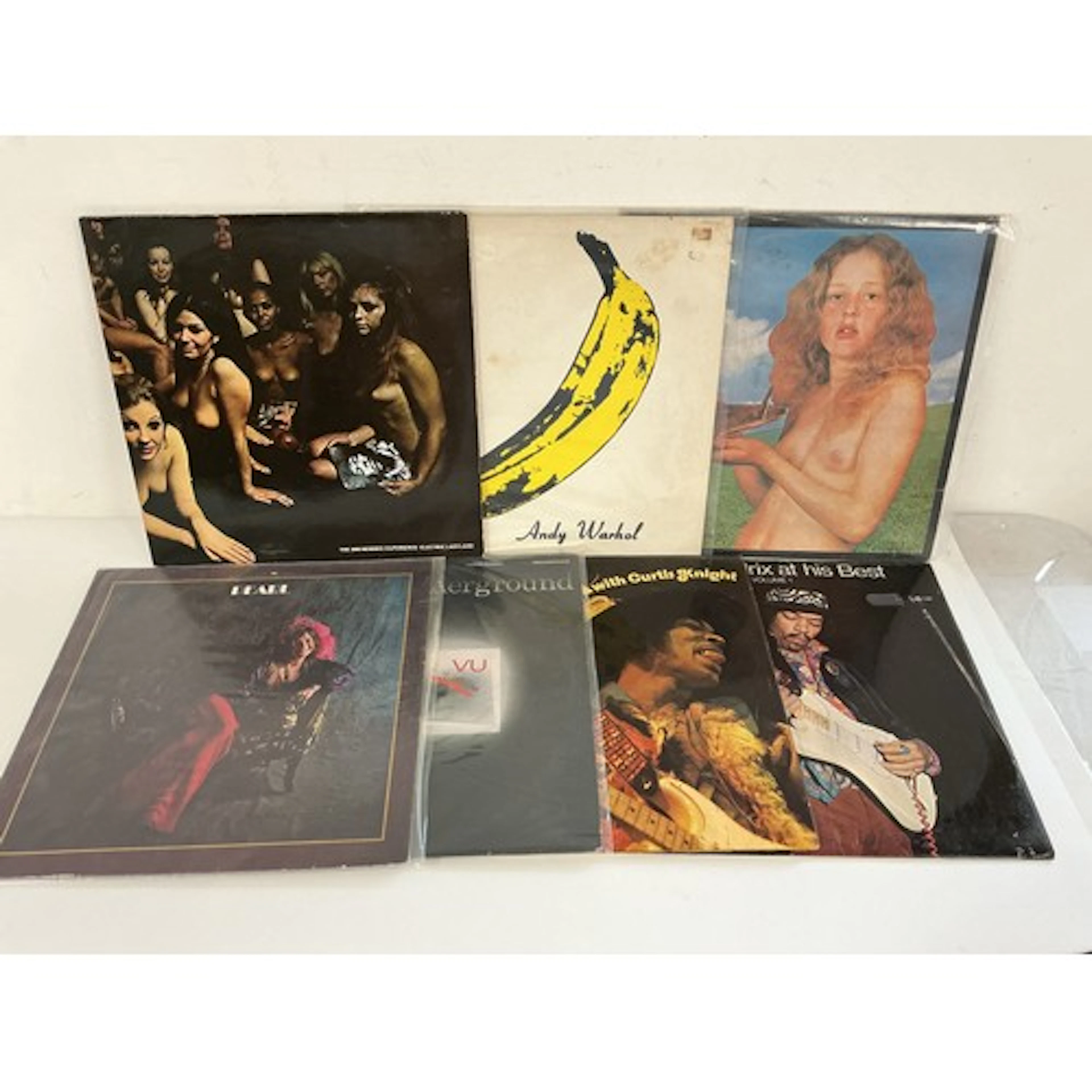 Seven LPs by various artists including Jimi Hendrix, Velvet ...