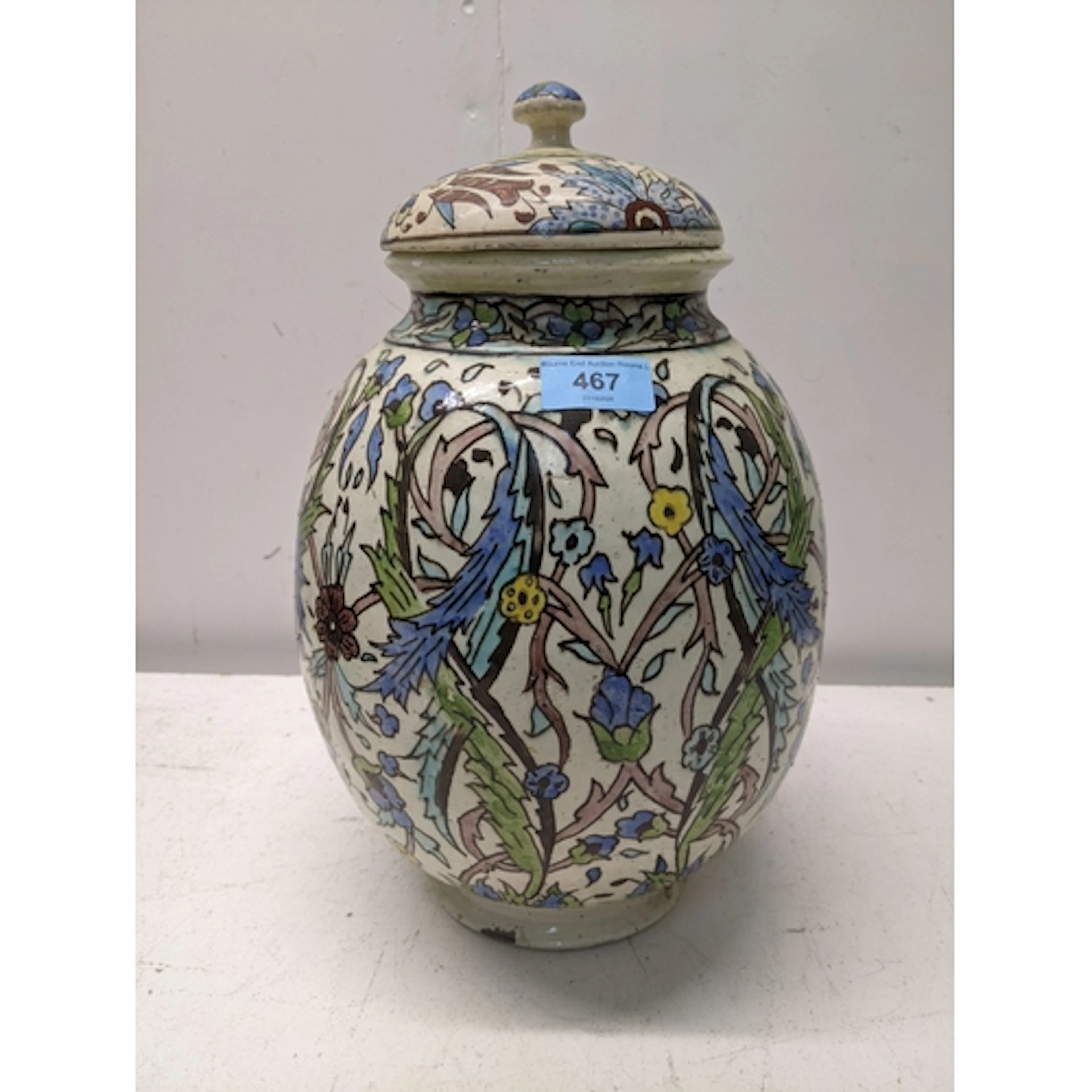 A late 19th century Iranian Qajar style vase and cover, foot...
