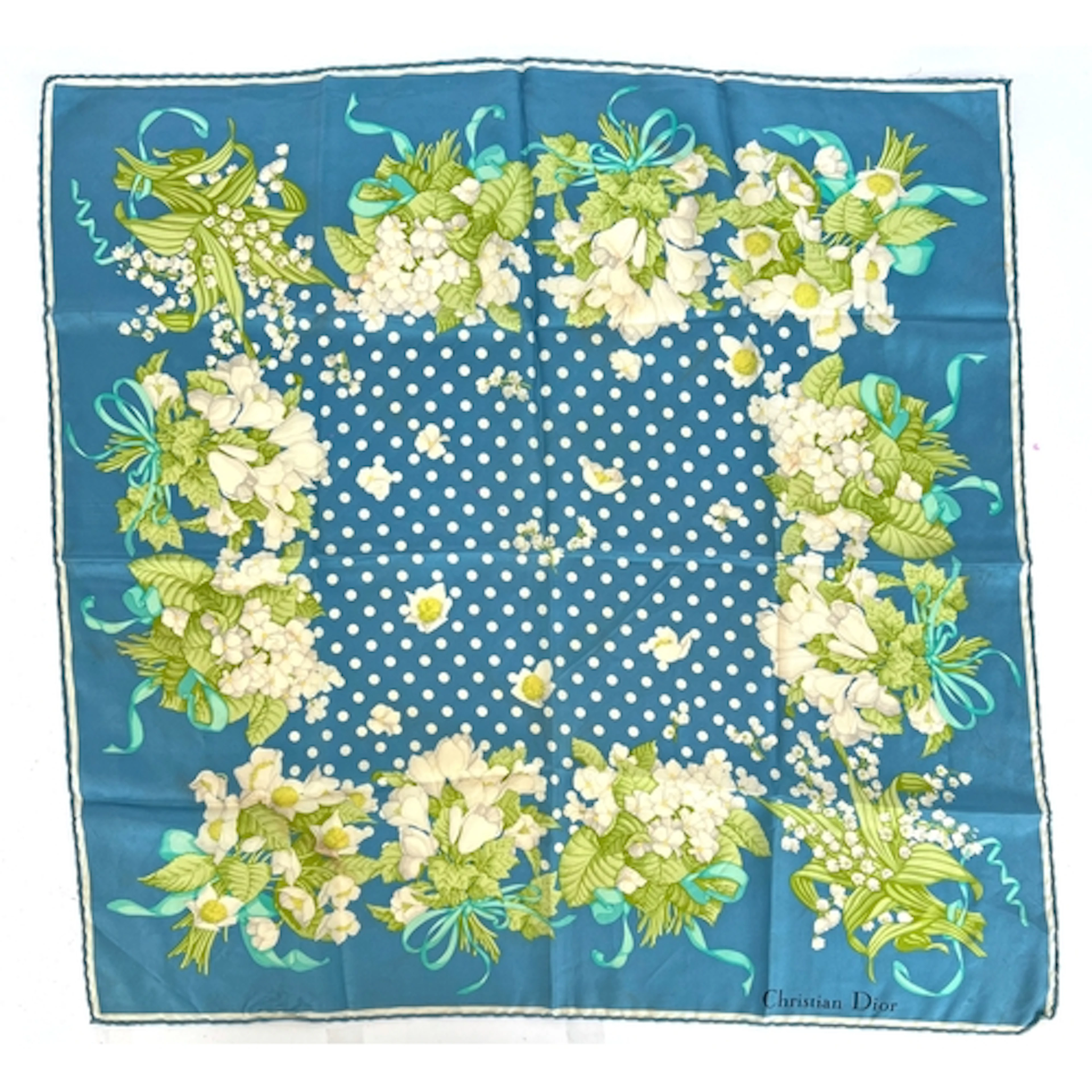 A Christian Dior silk scarf in a white floral print on blue ...