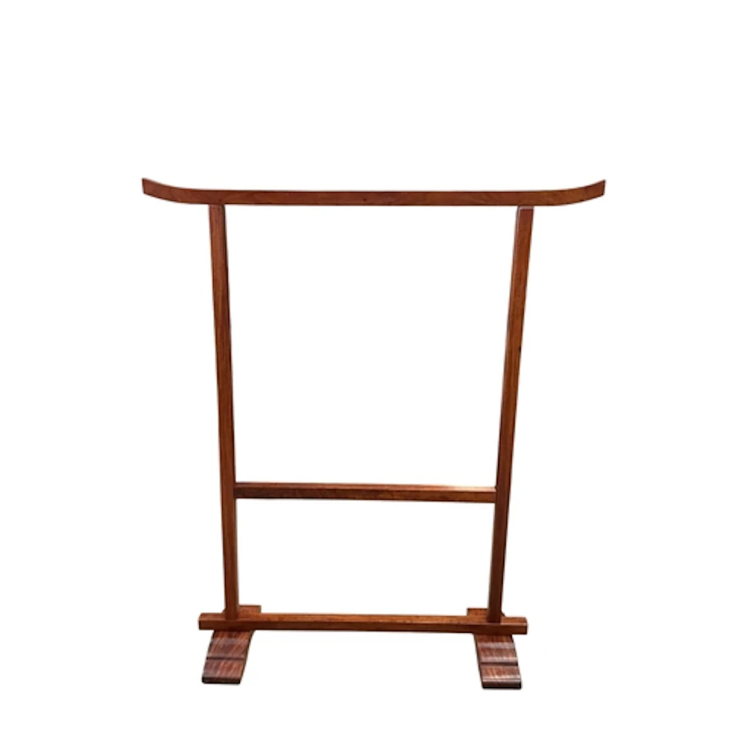 A padouk wood kimono stand, width 130cm, depth 38cm, height ...