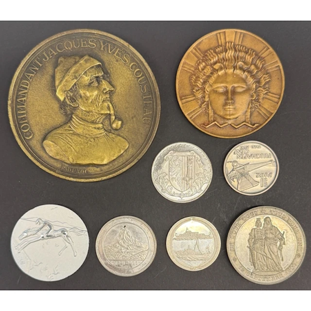 A group of eight World commemorative medals and medallions, ...
