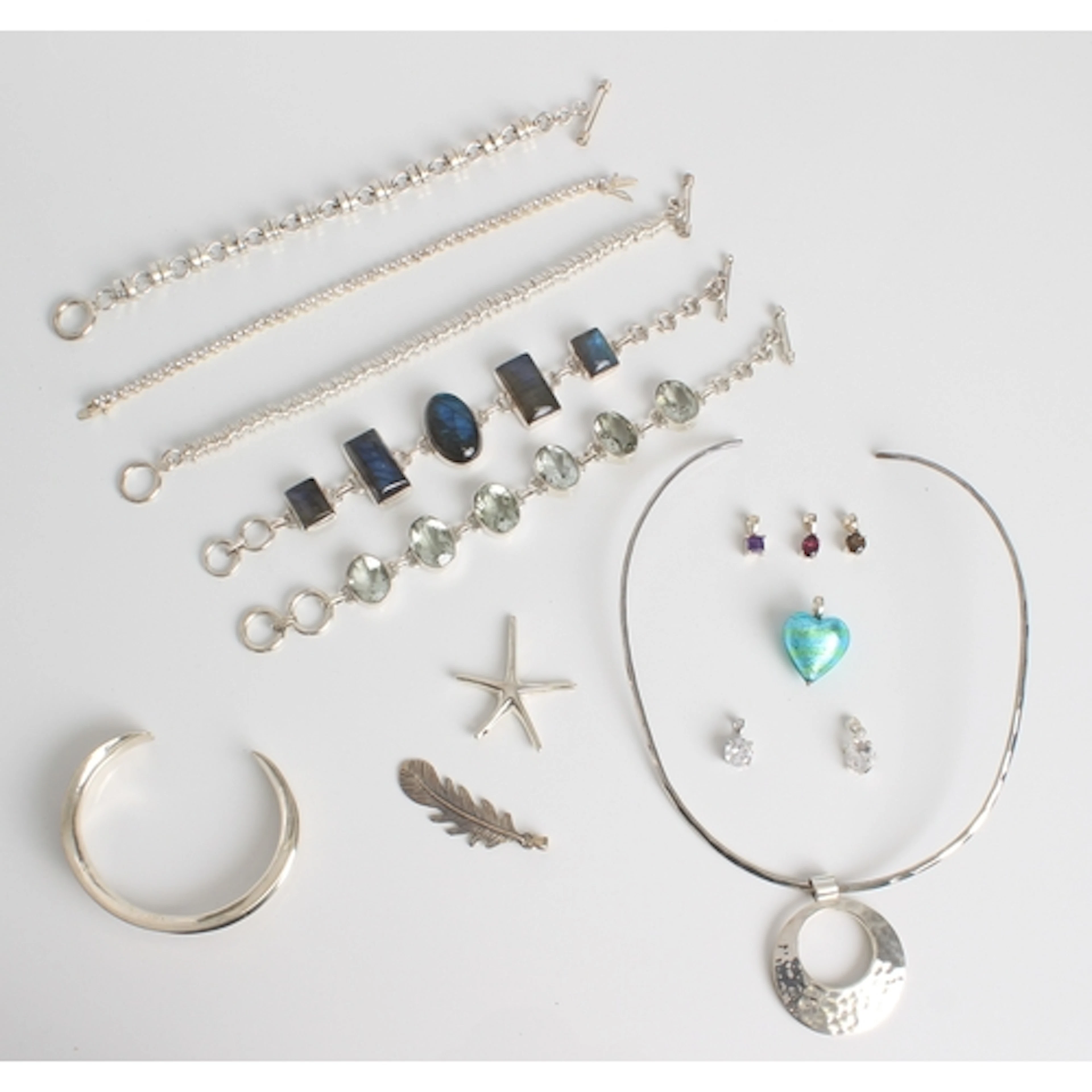 A collection of sterling silver jewellery, some with mixed g...