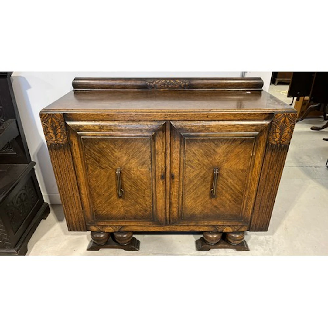 Early 20th Century oak sideboard with two doors on a plinth ...