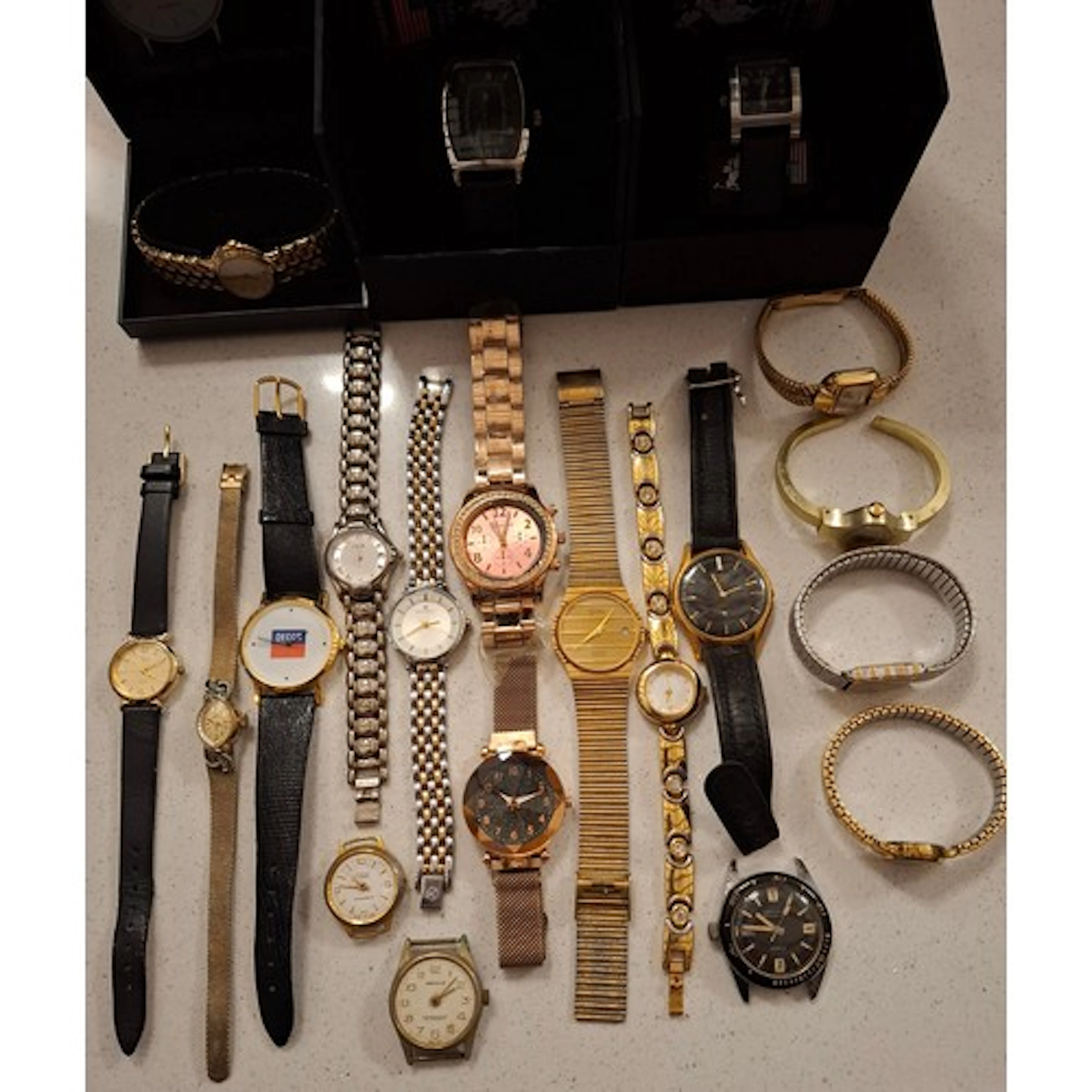 A group of wristwatches to include a ladies gold tone Accuri...