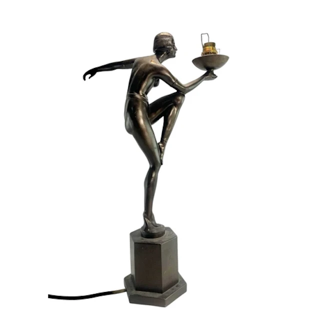 A 20th century Art Deco-style bronzed figural desk or table ...