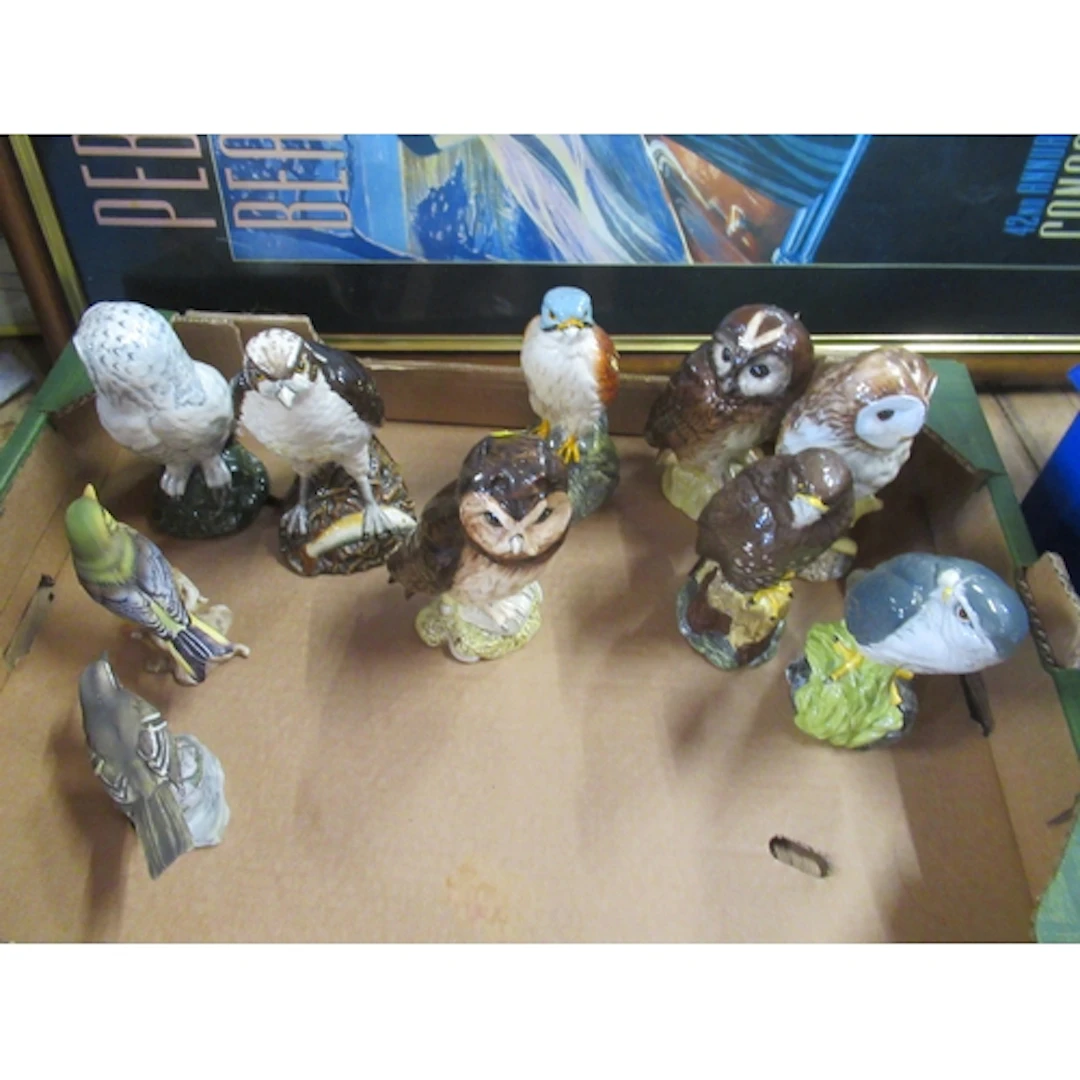 8 Royal Doulton bird whiskey decanter, together with two oth...
