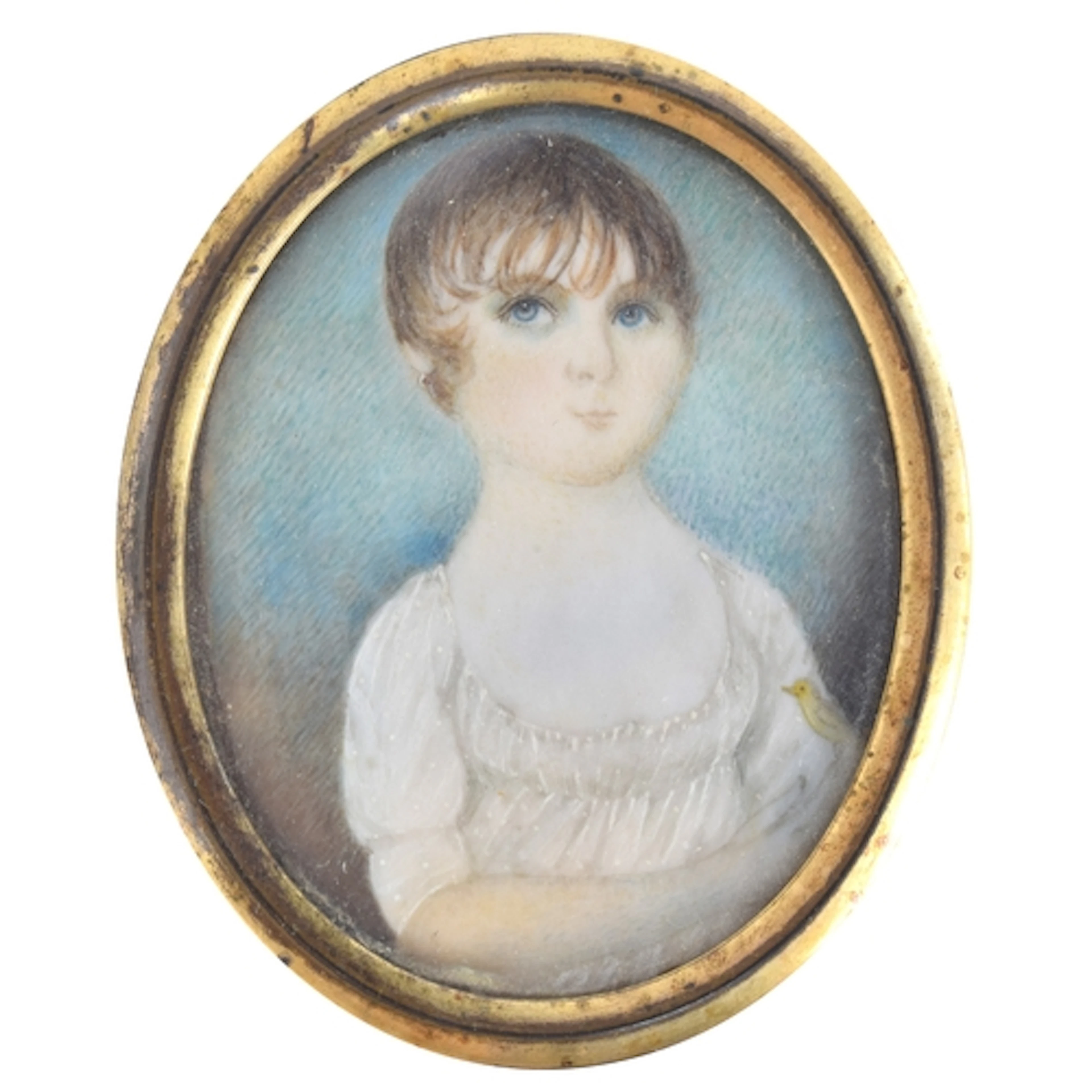 An early 19th century portrait miniature on ivory of a young...