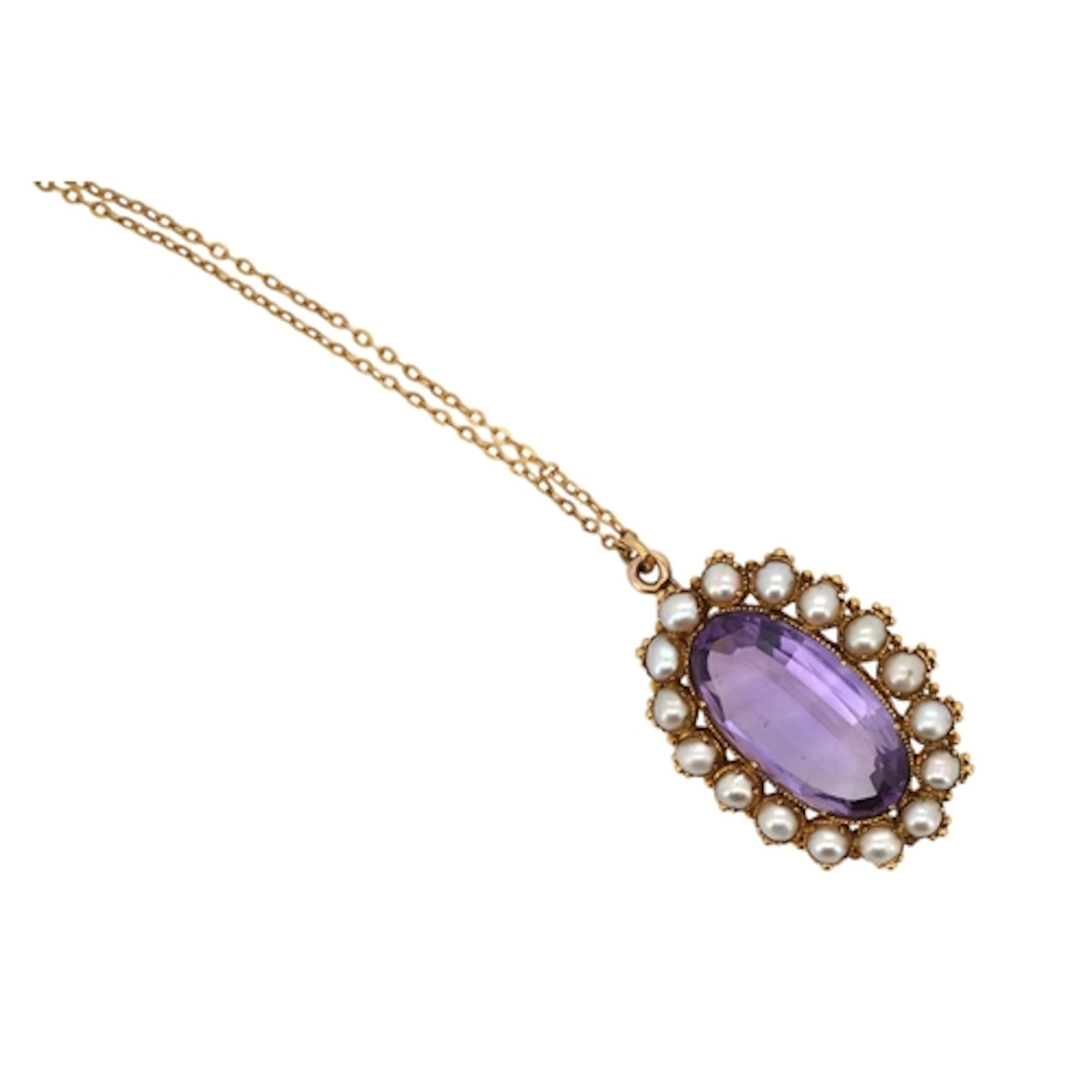 An amethyst and split pearl pendant, 19th century, set with ...