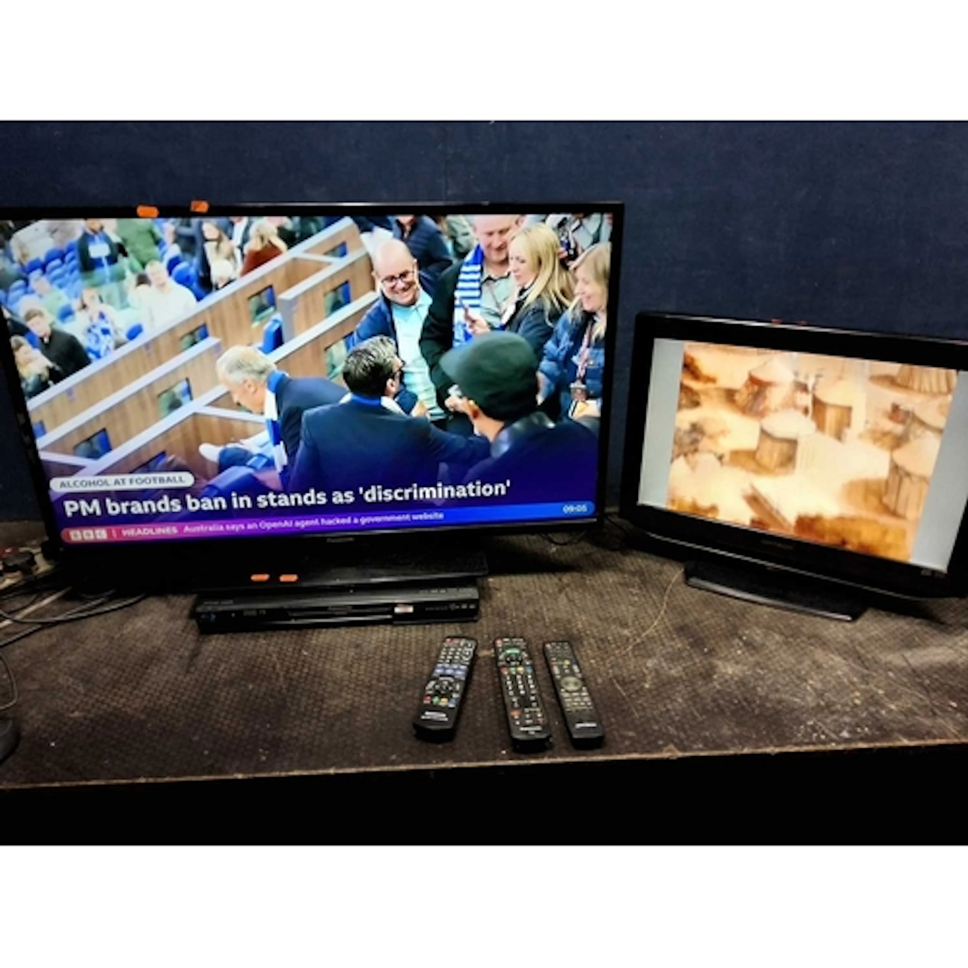 A PANASONIC TX-39A300B 39in TV with remote, a Panasonic Blu-...