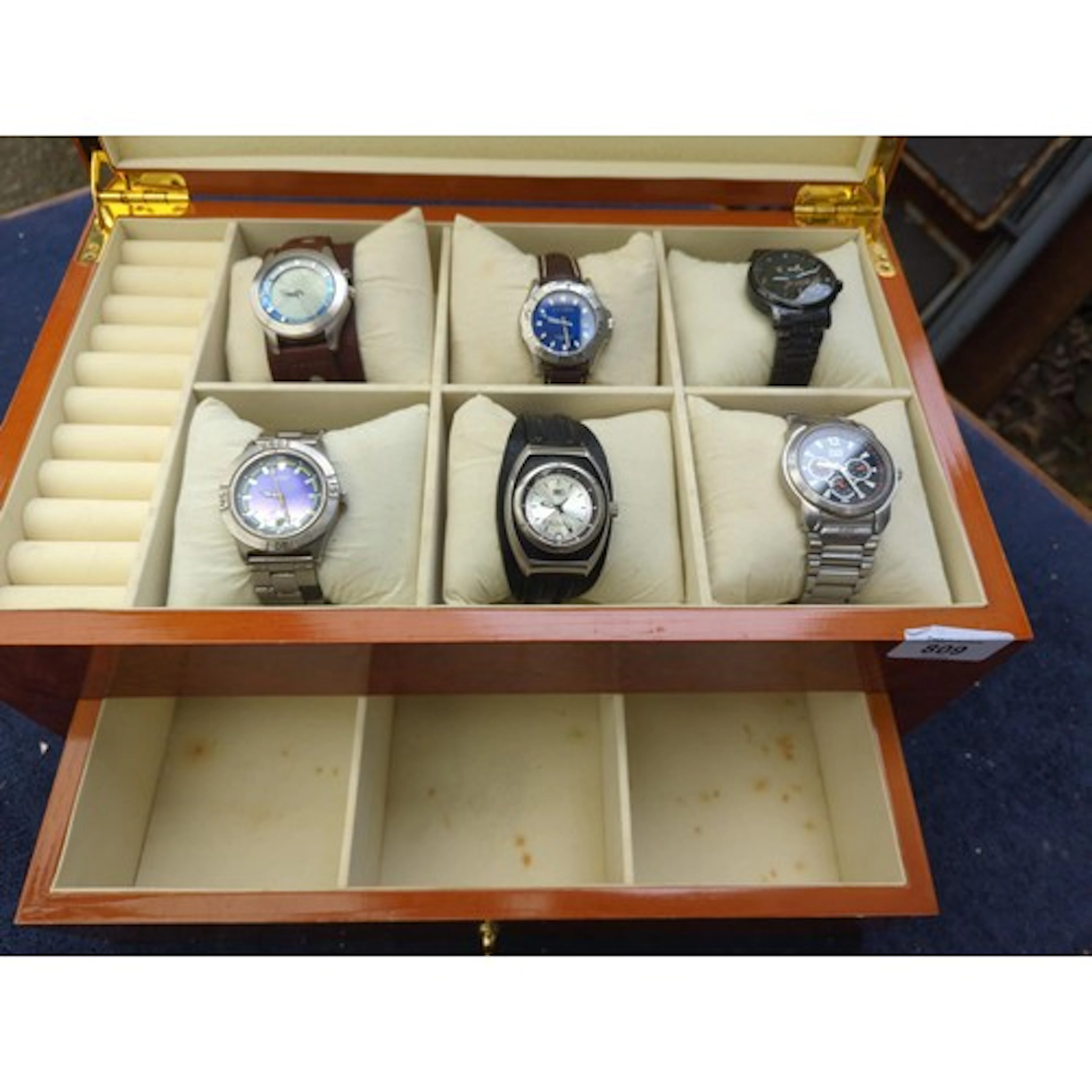 Watch presentation case with contents including Storm, Anima...