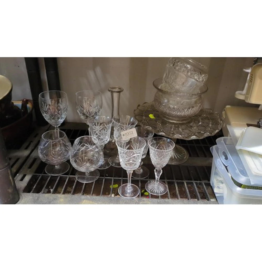 A collection of cut-glass tableware, including assorted stem...