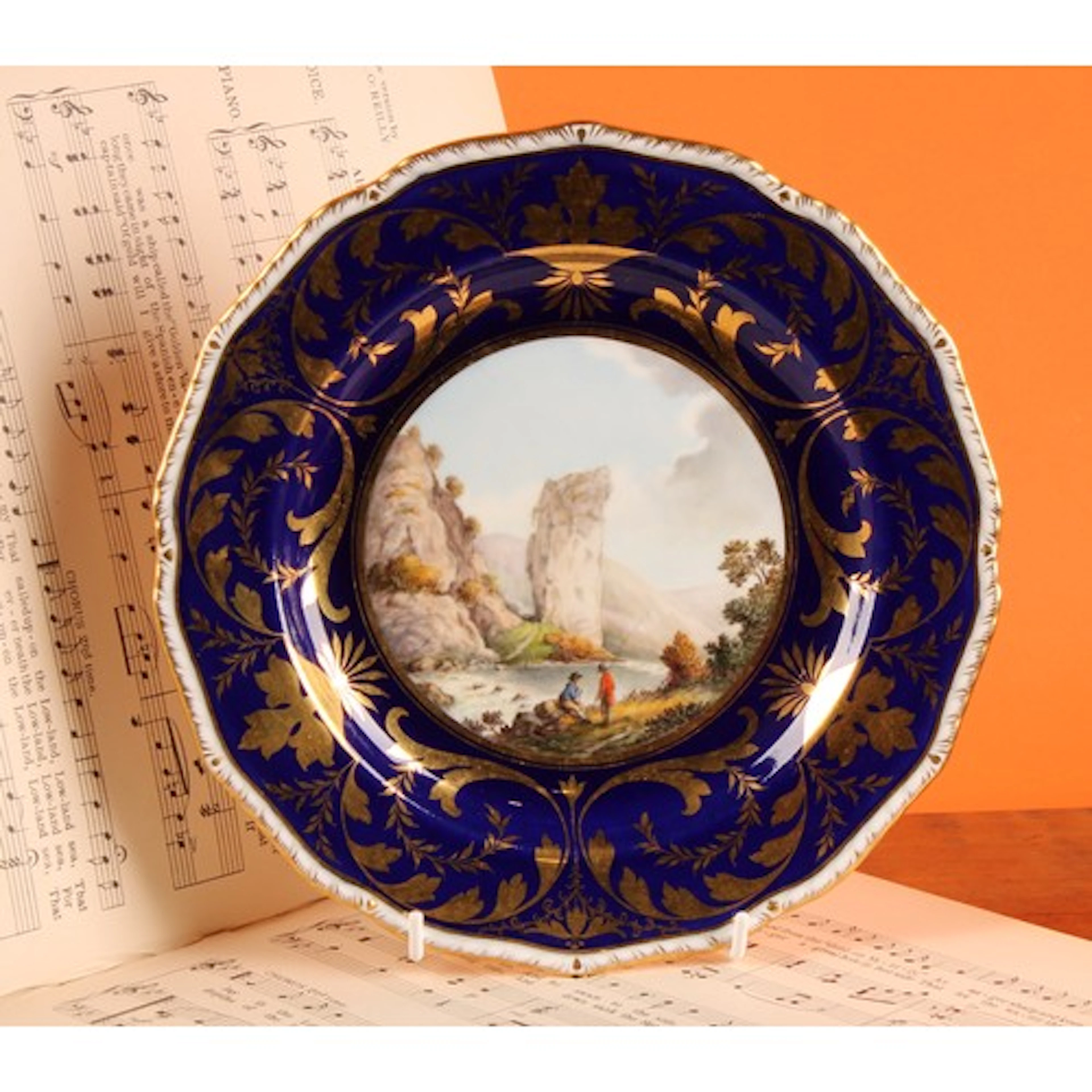 A Sampson Hancock Derby named view shaped circular plate, pa...