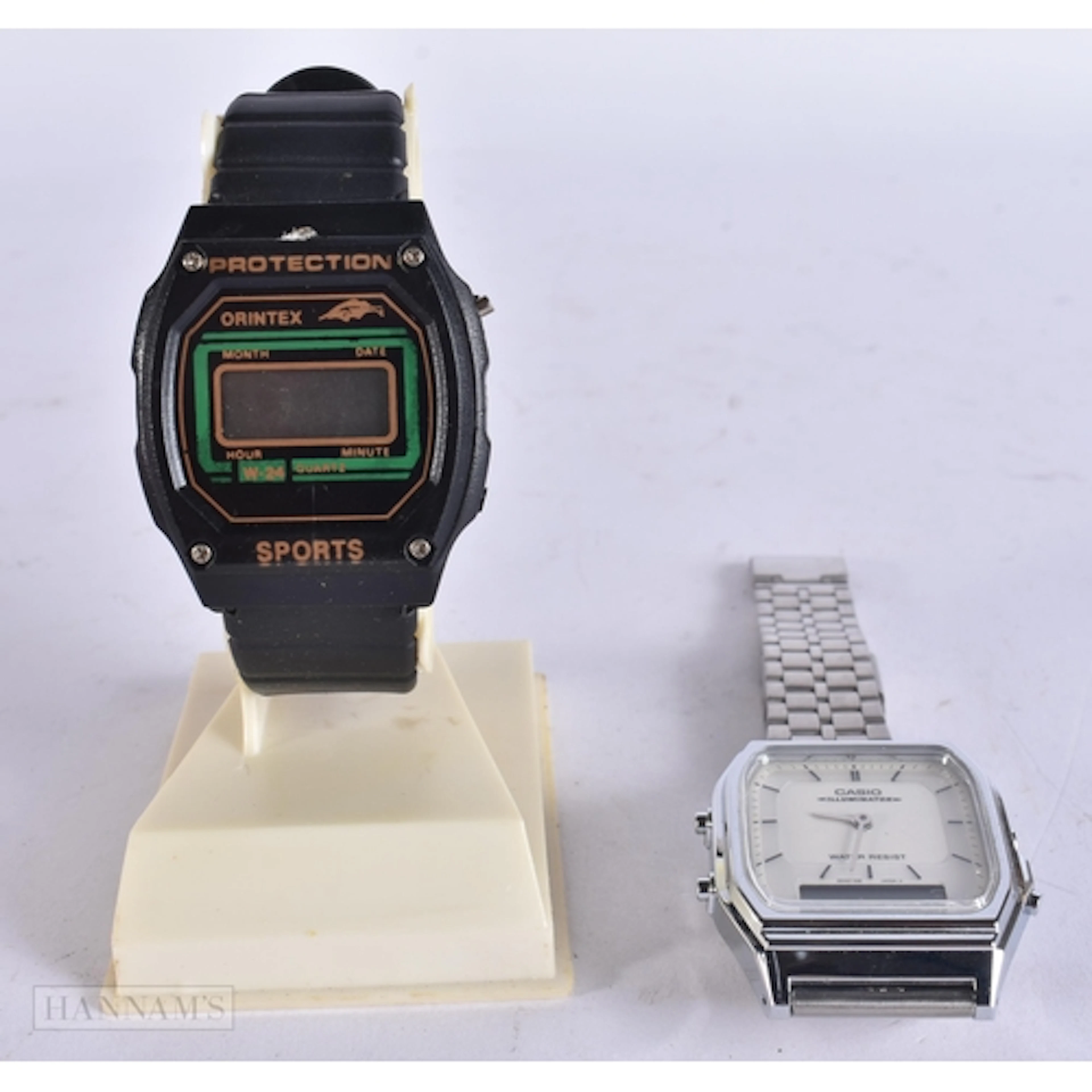 A CASIO ILLUMINATOR WATCH and another. (2)