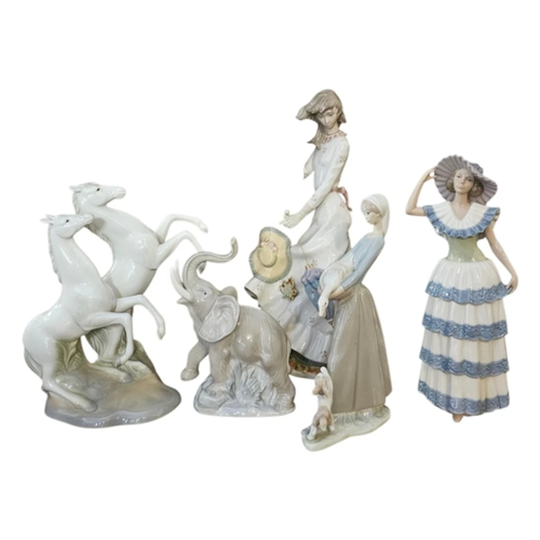 NAO, A COLLECTION OF VINTAGE PORCELAIN FIGURES To include a ...