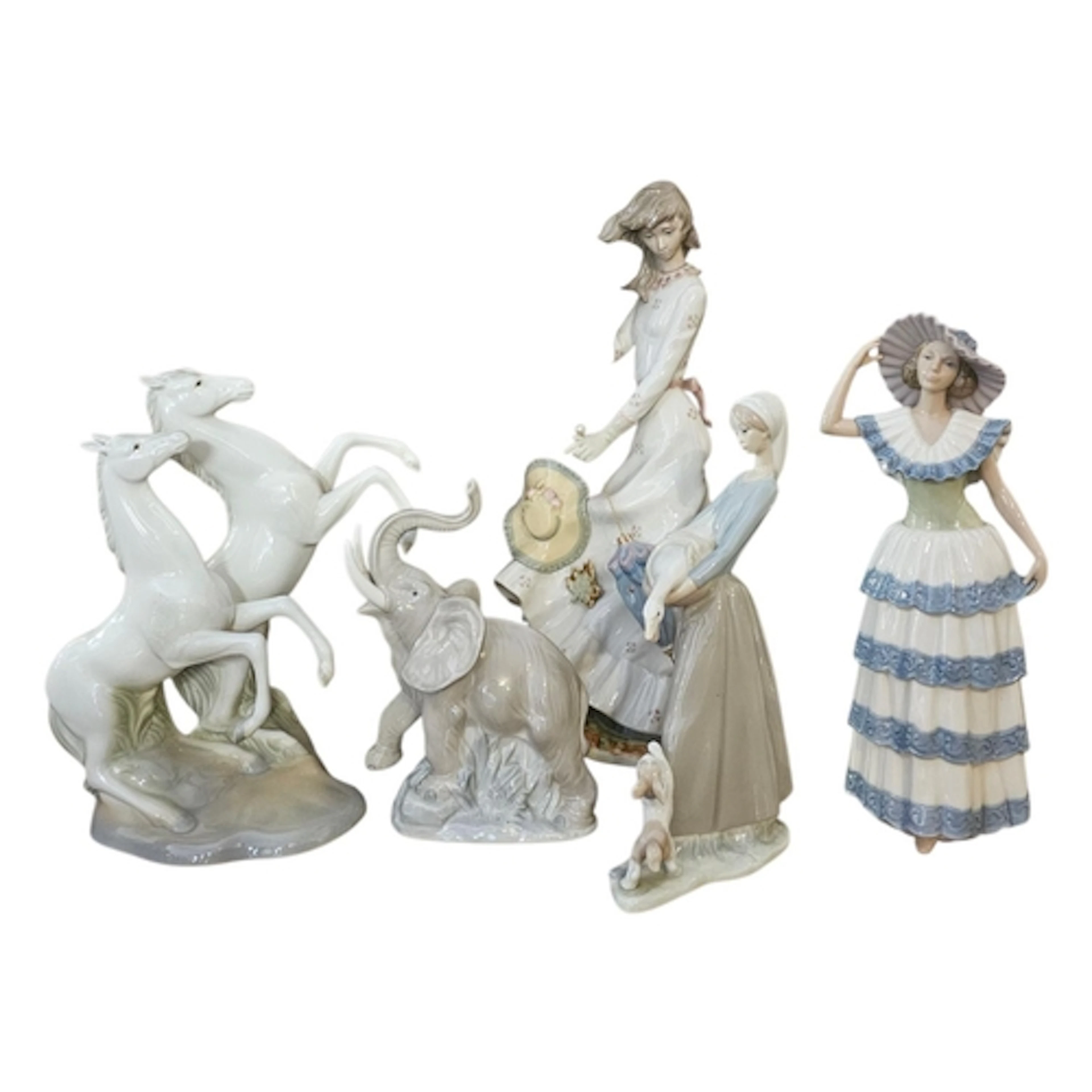 NAO, A COLLECTION OF VINTAGE PORCELAIN FIGURES To include a ...