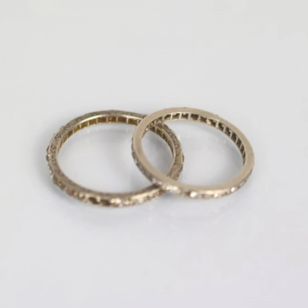 An Art Deco diamond full eternity ring, set with mixed cut d...