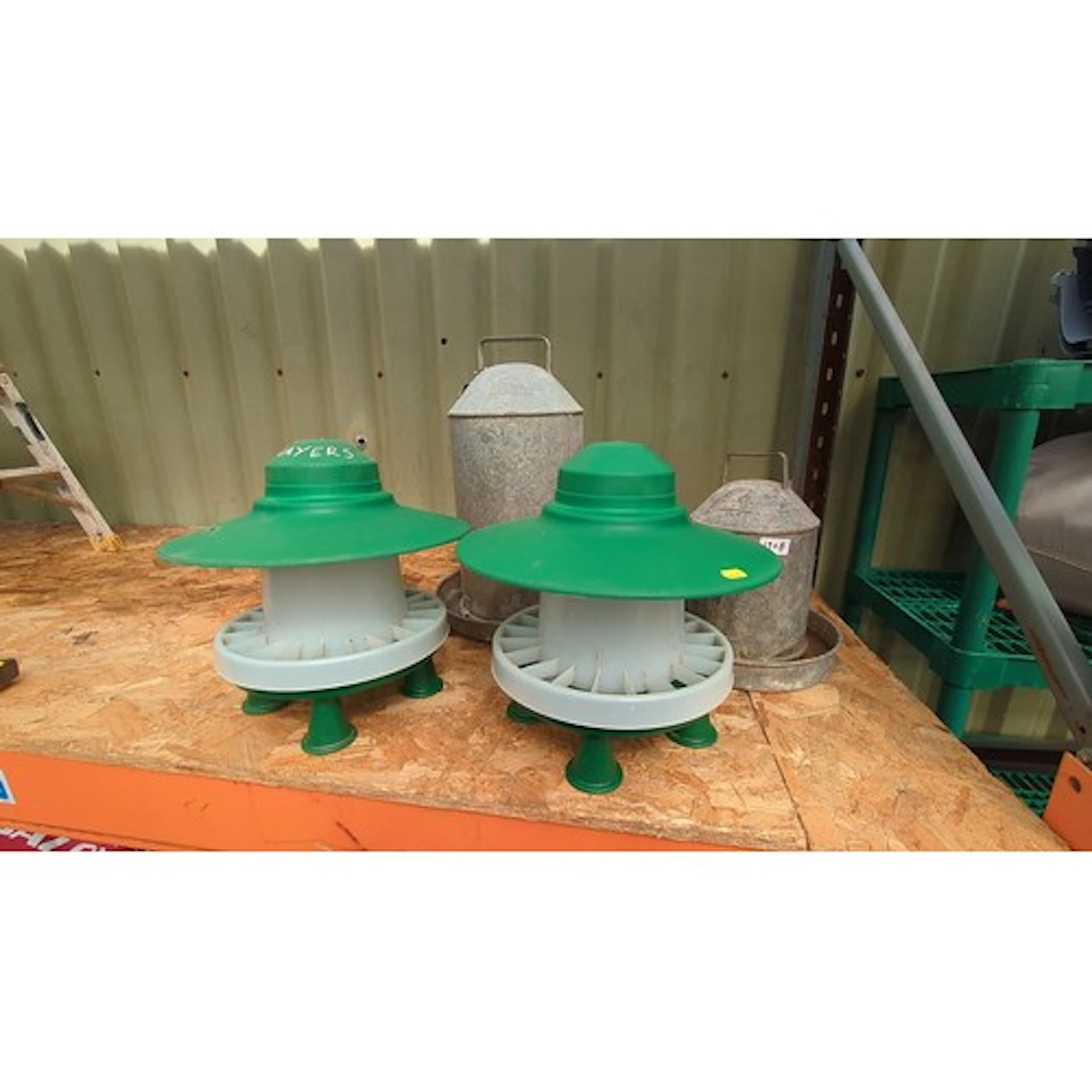 A group of poultry feeding equipment, comprising two moulded...