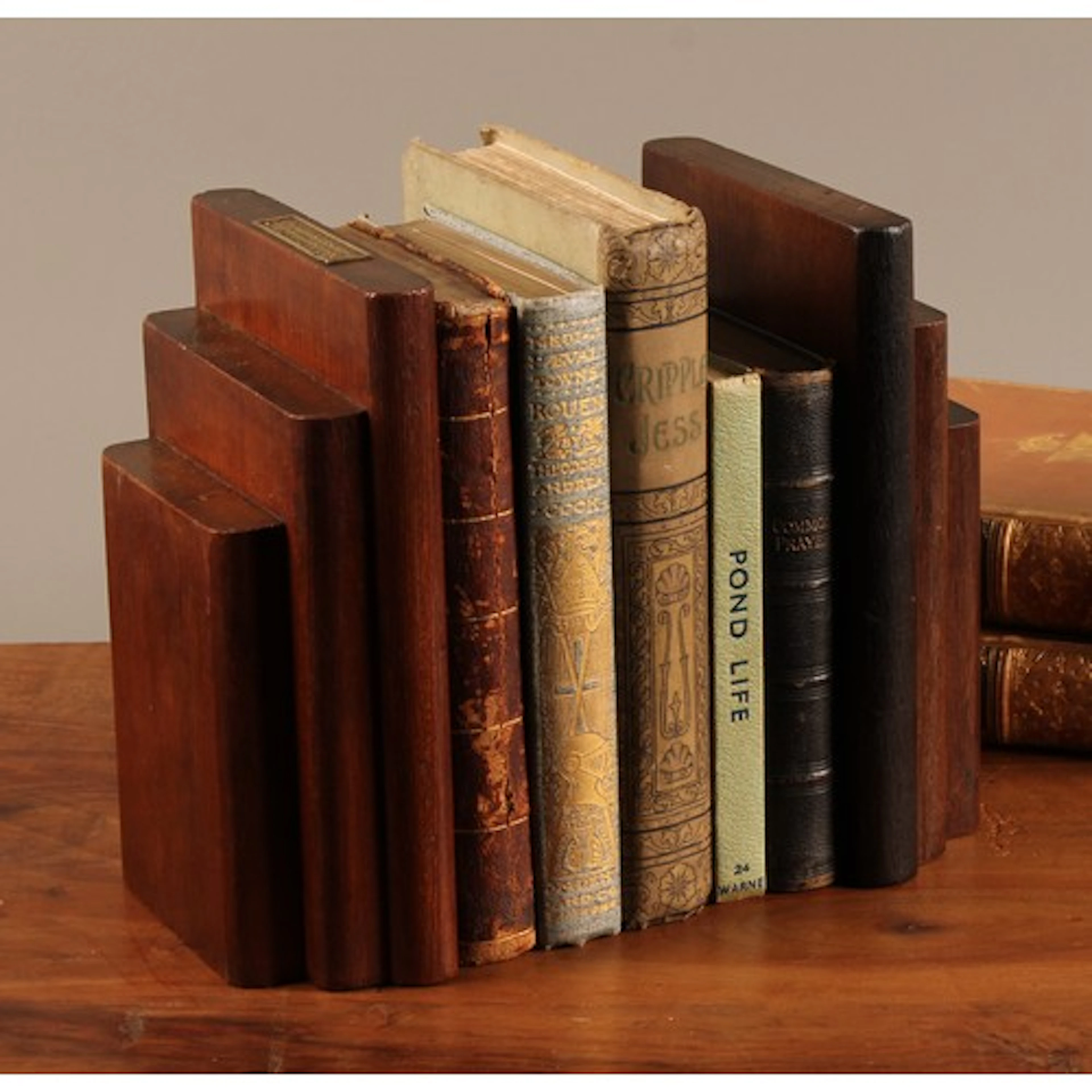 A pair of early 20th century bookends from the Teak of HMS I...