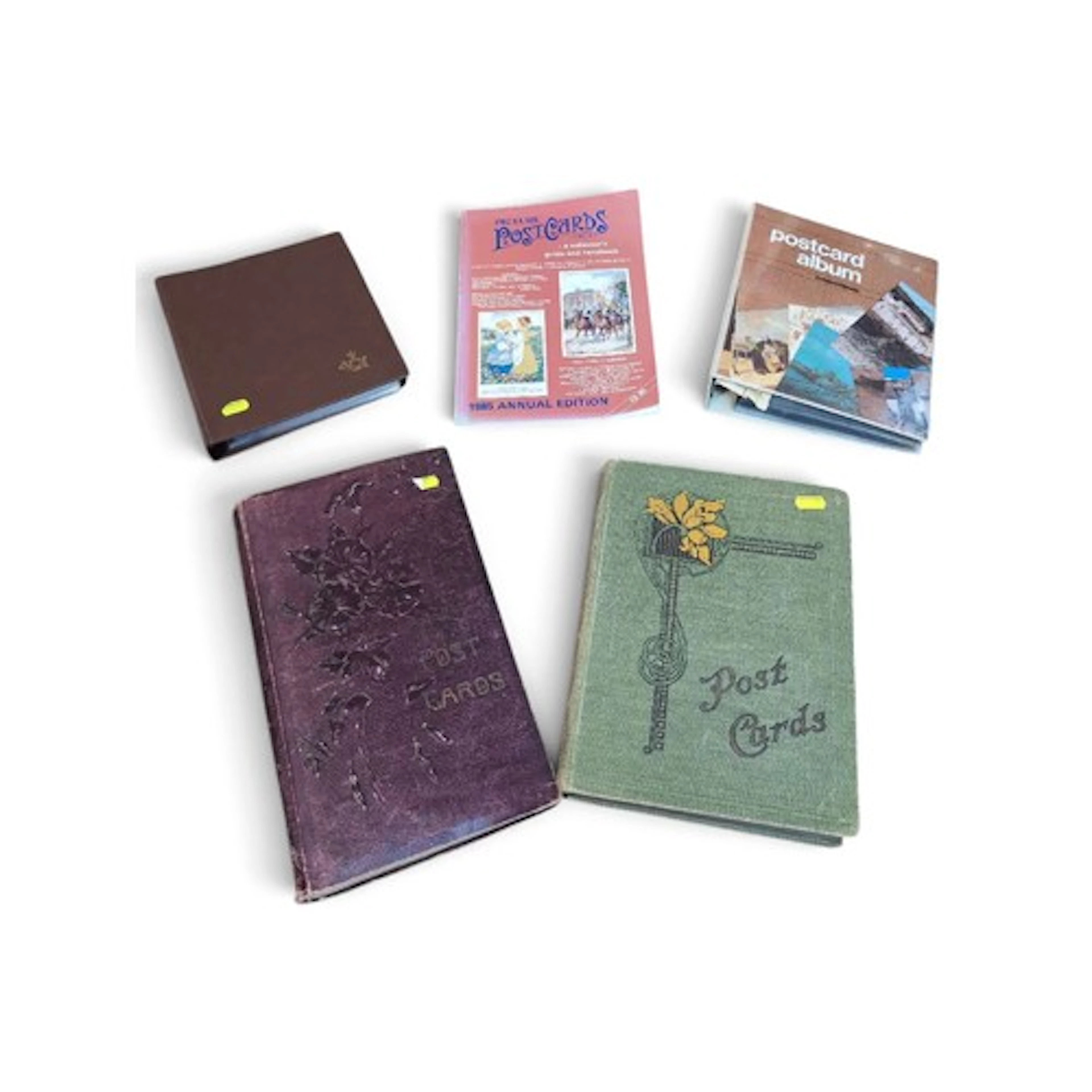 Collection of variously-themed vintage postcards across 4 al...