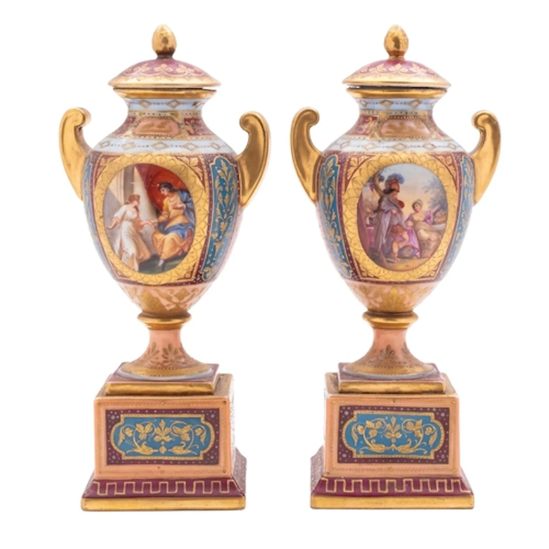 A pair of Austrian porcelain pedestal vases and covers decor...