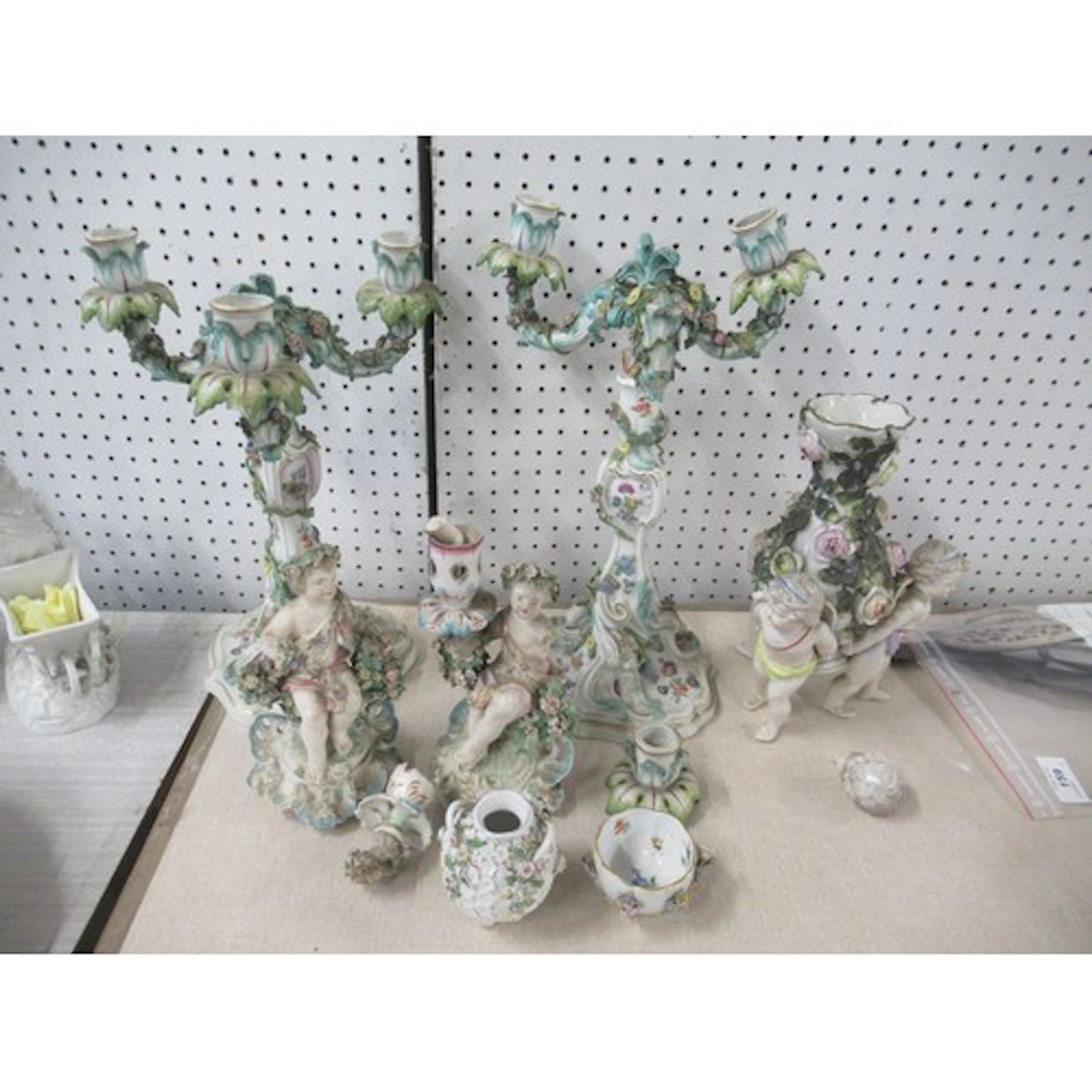 A collection of continental encrusted porcelain, to include ...