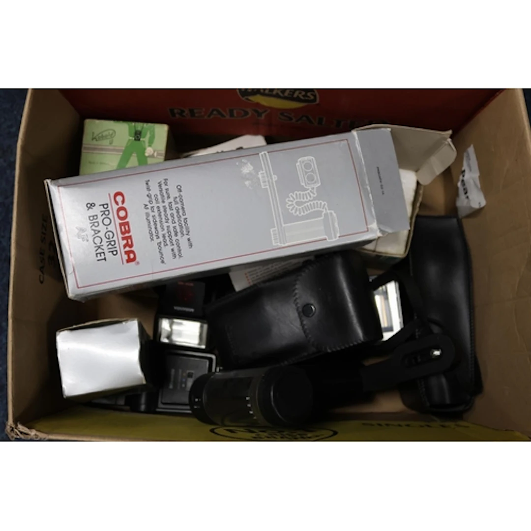 Vintage camera equipment including flash guns, Agfa, assorte...