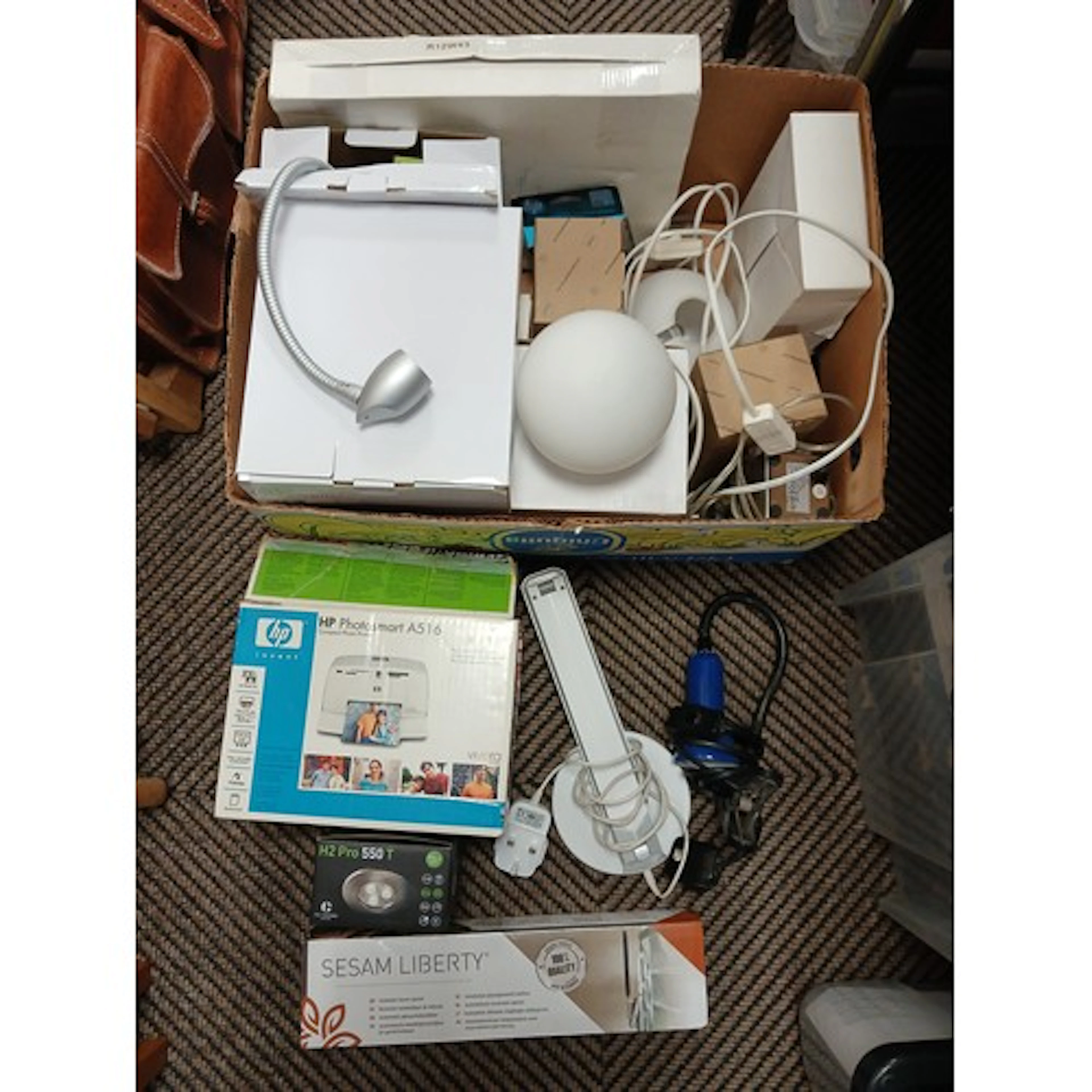 Compact photo printer, table lamps, an automatic louvre open...